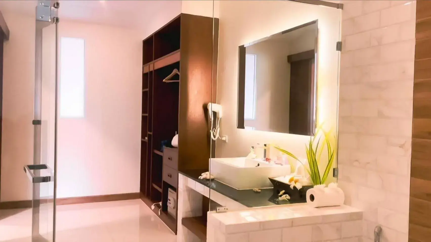 Bathroom in Aura Samui Best Beach Hotel - SHA Plus Bathroom in Aura Samui Best Beach Hotel - SHA Plus