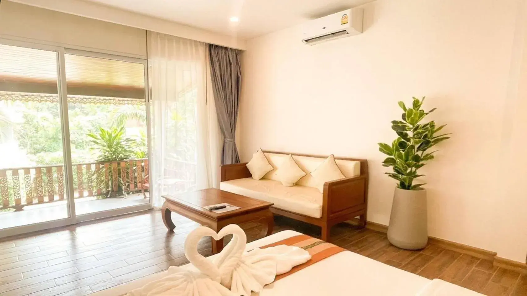 Seating area, Bed in Aura Samui Best Beach Hotel - SHA Plus Seating area, Bed in Aura Samui Best Beach Hotel - SHA Plus