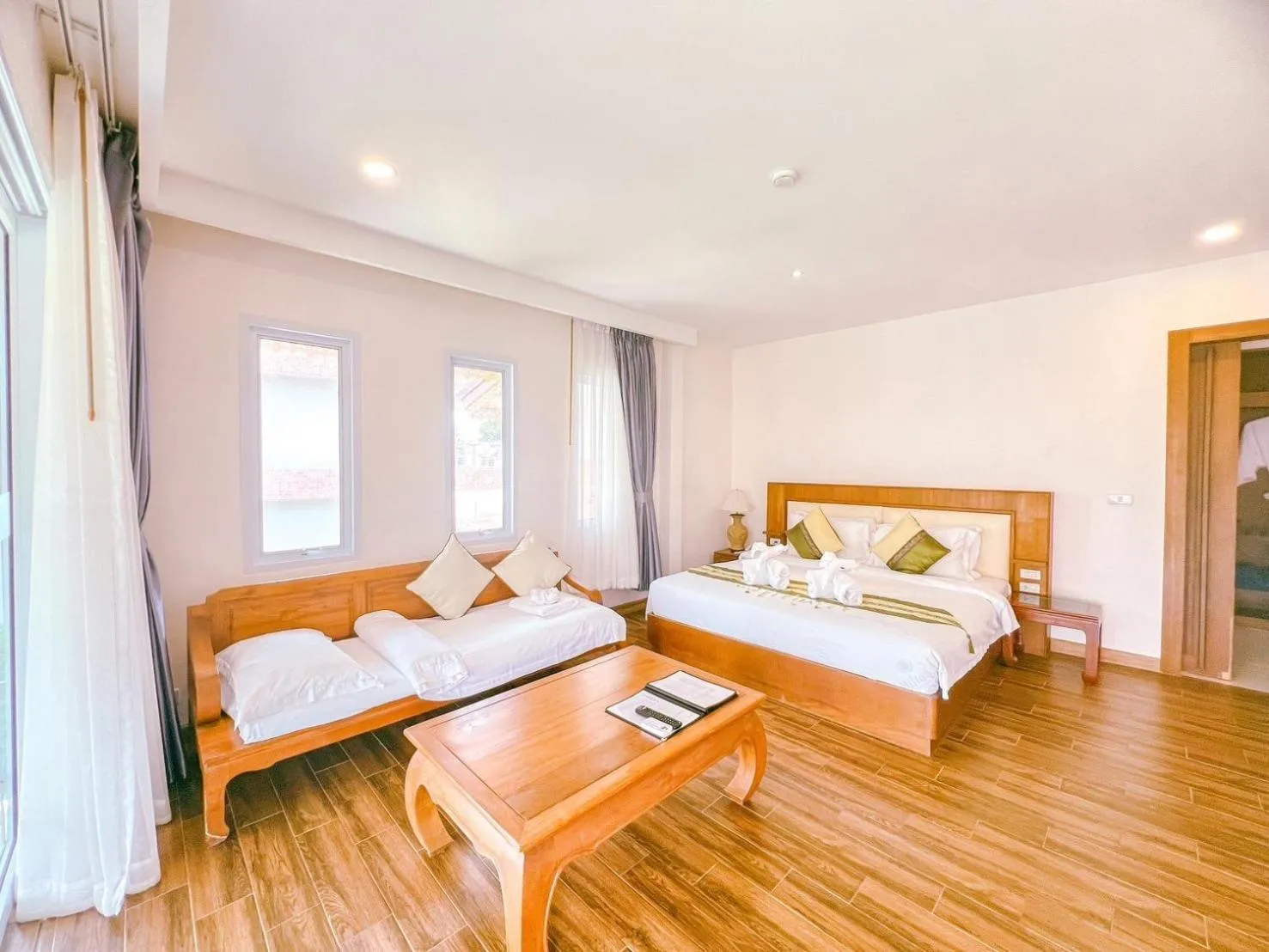 Bed in Aura Samui Best Beach Hotel - SHA Plus