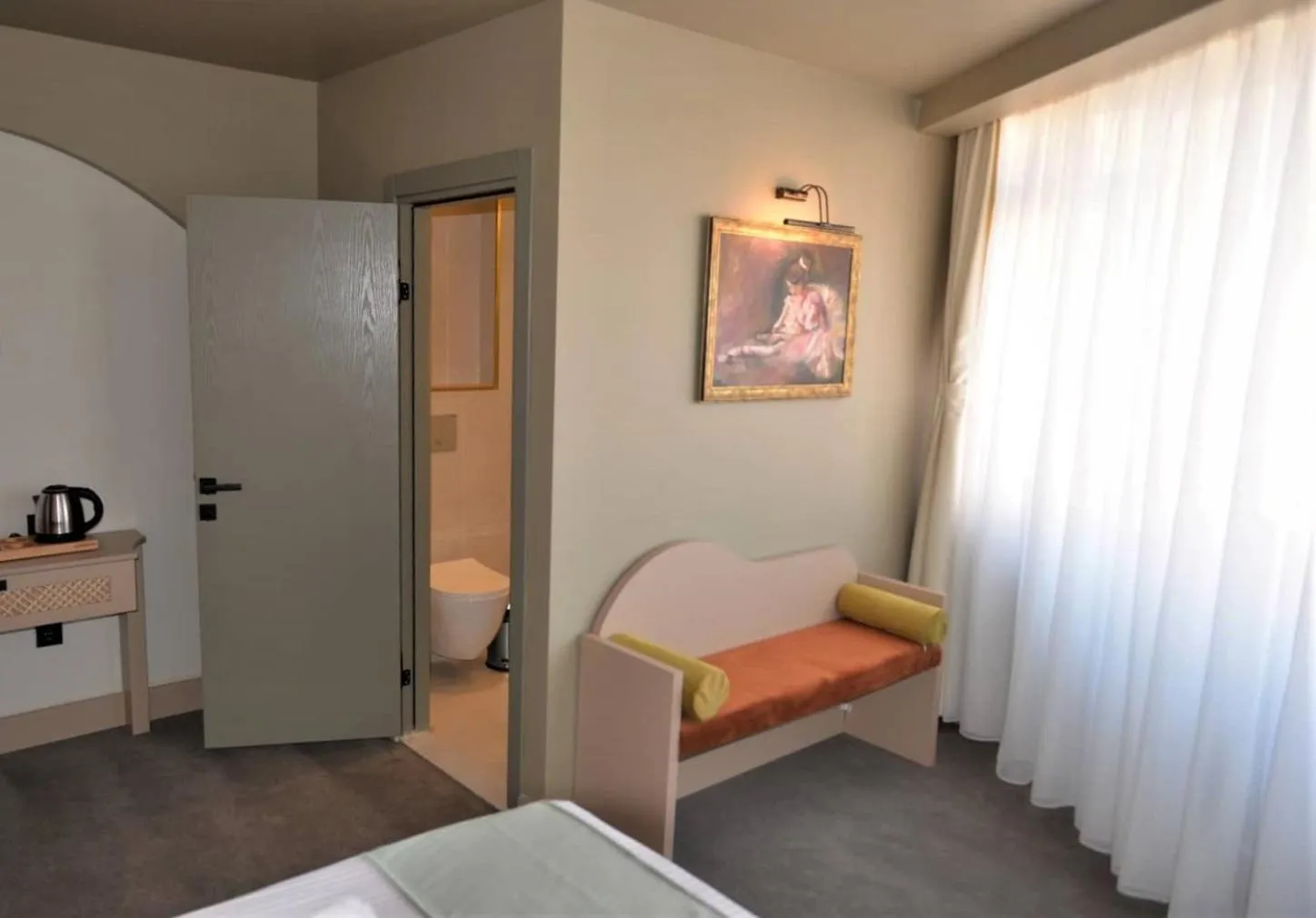 Bed in By Kinyas Hotel