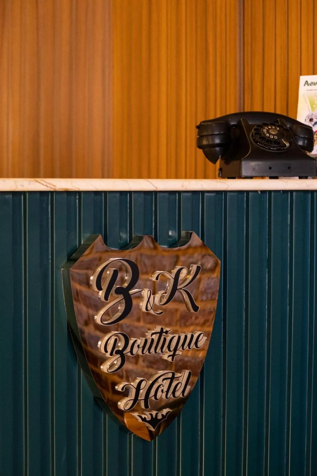 Property logo or sign in By Kinyas Hotel