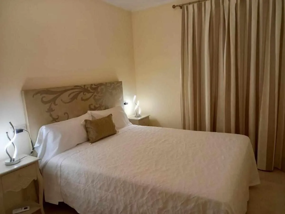 Bedroom, Bed in Apartamento sauceda 7