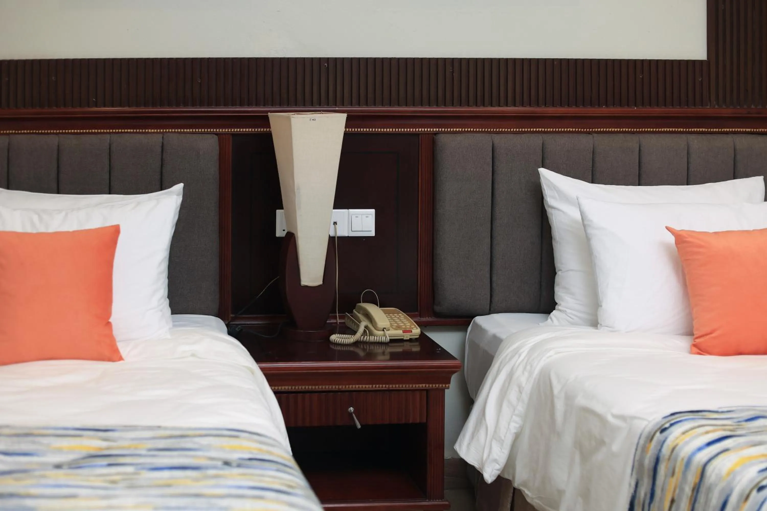 Bed in Royal Suites Hotel-Kampala