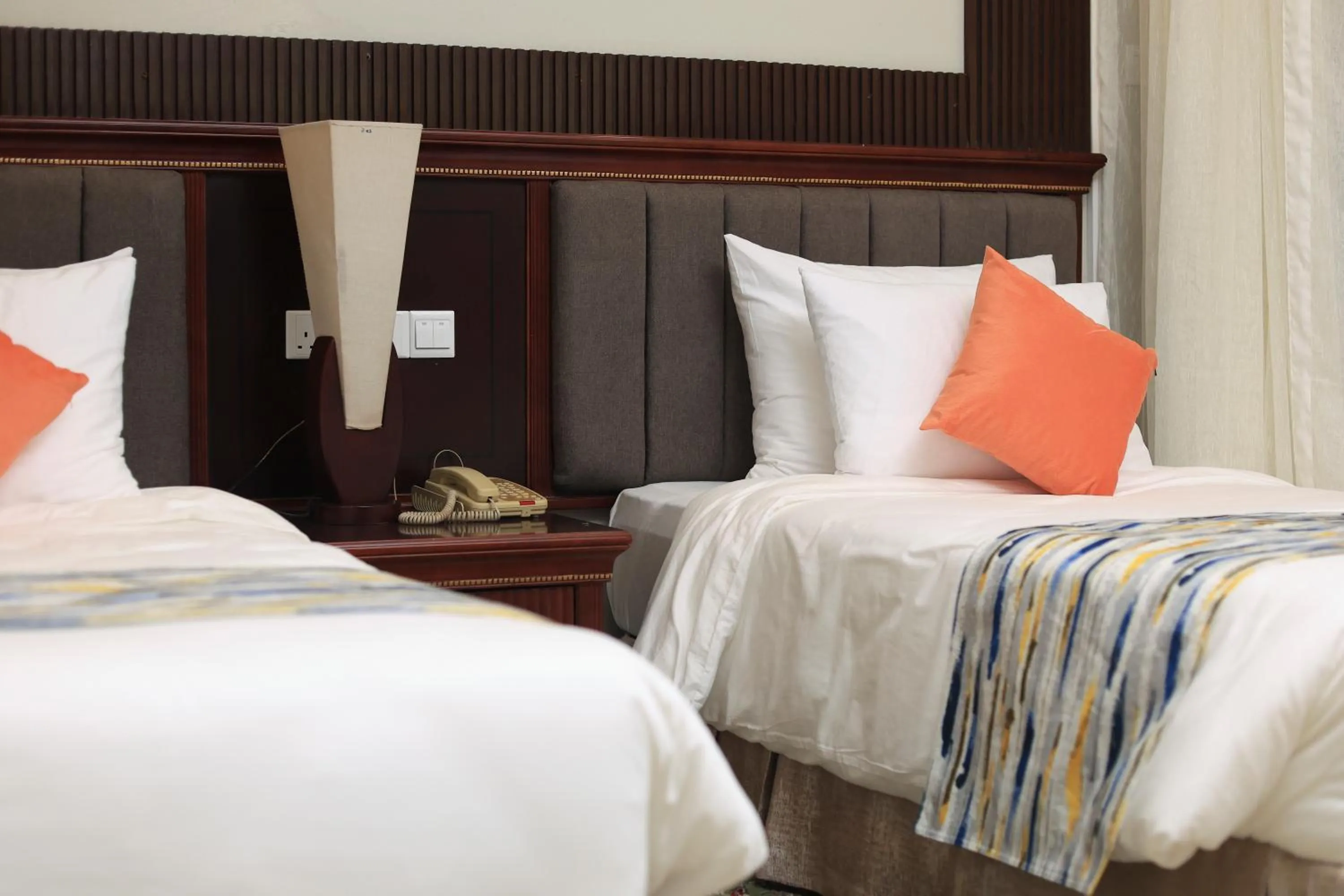 Bed in Royal Suites Hotel-Kampala