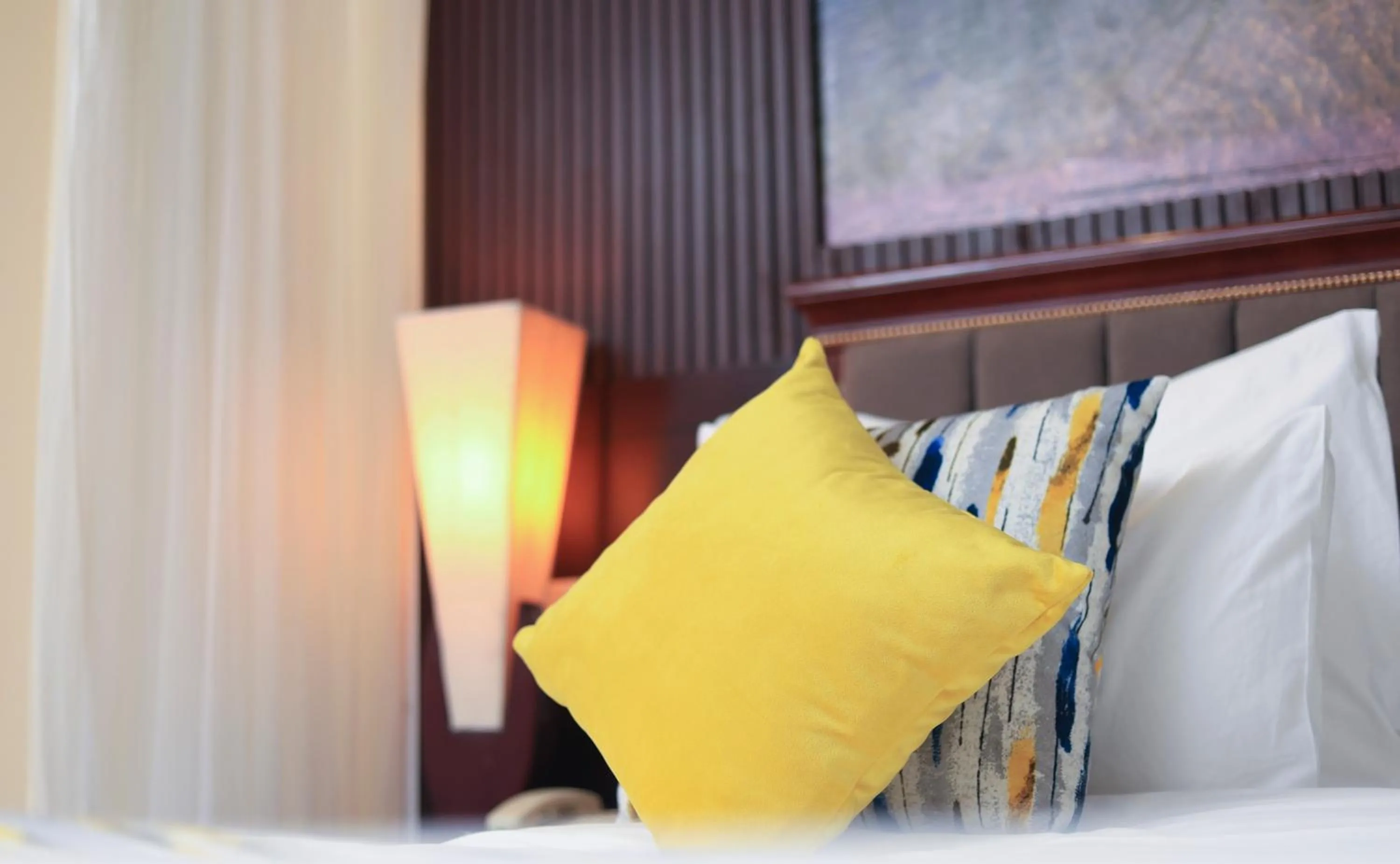 Bed in Royal Suites Hotel-Kampala