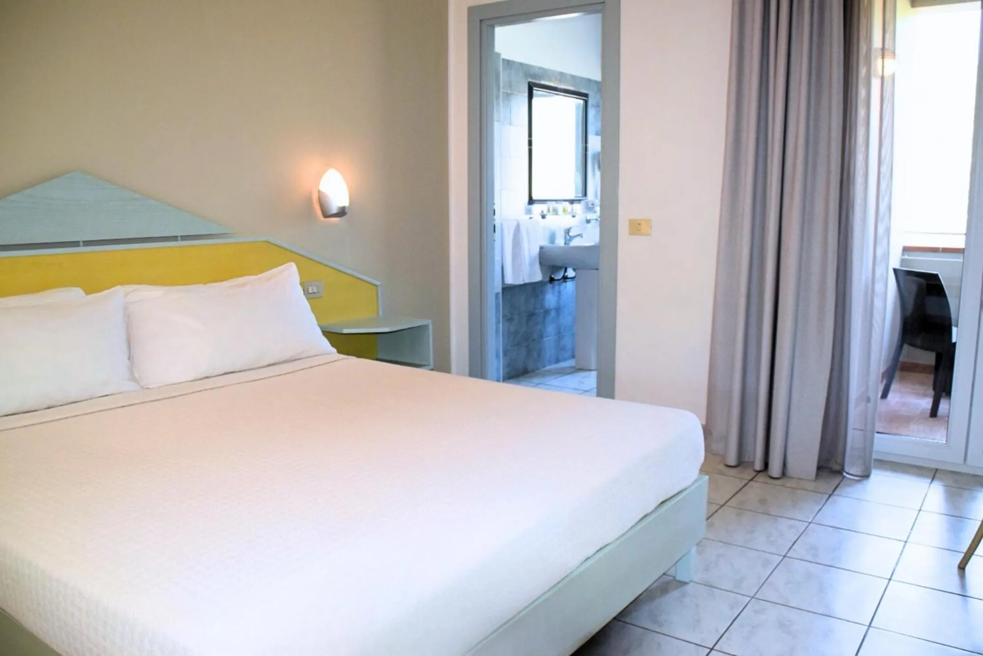 Bed in Lu' Hotel Porto Pino