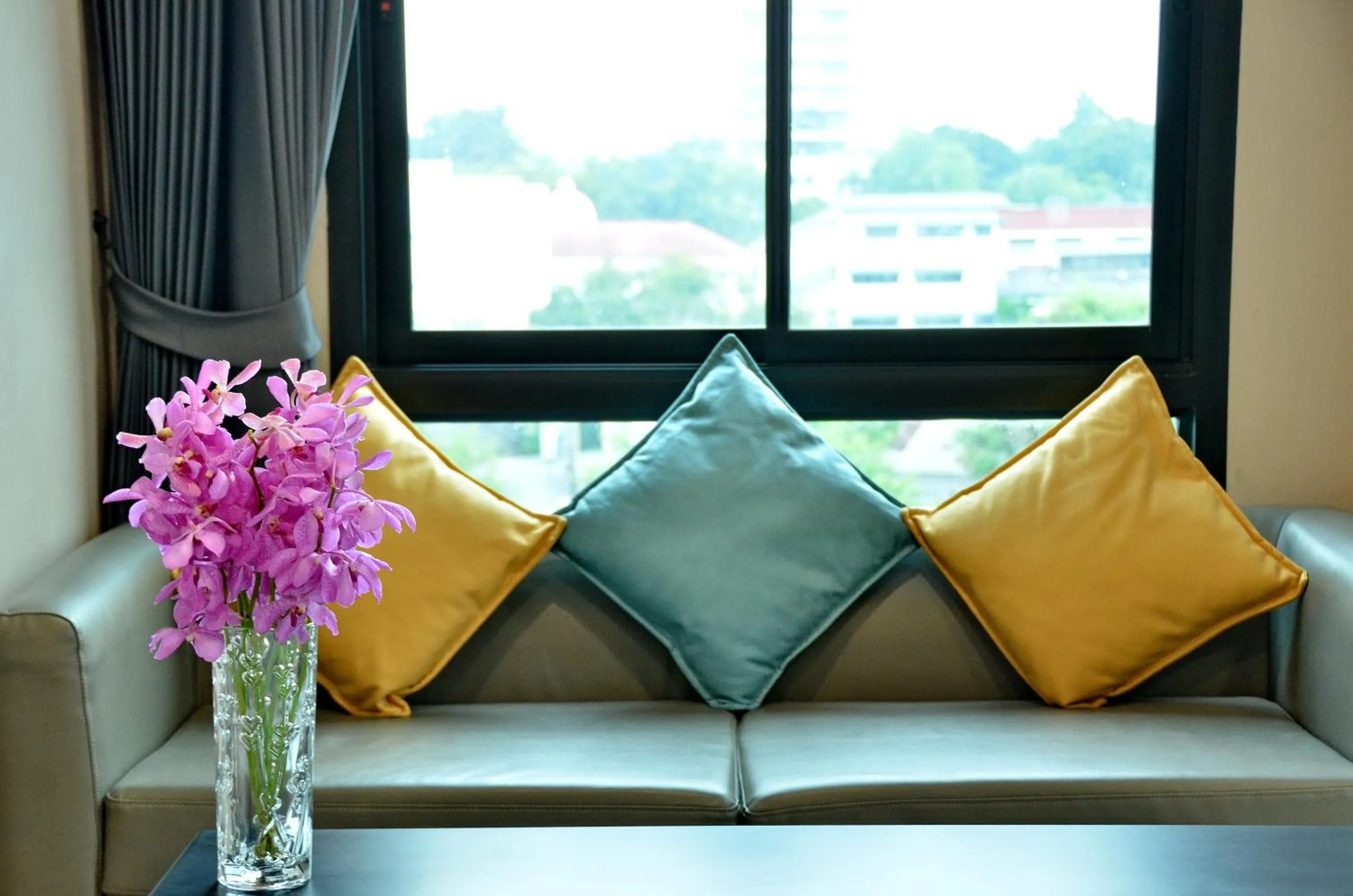 Living room in NORN Rimklong Bangkok Hotel