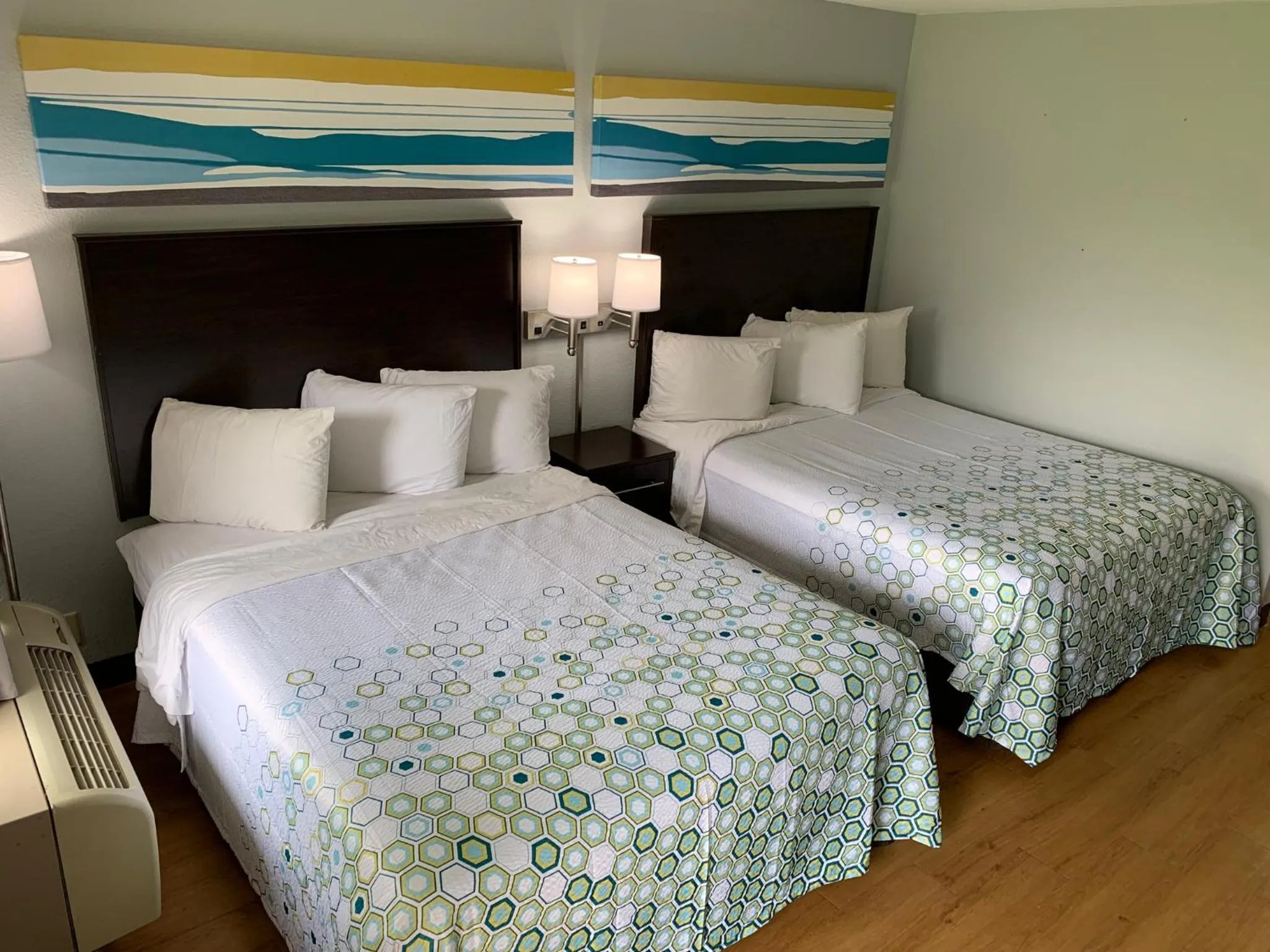 Photo of the whole room, Bed in HomeTowne Studios by Red Roof Battle Creek