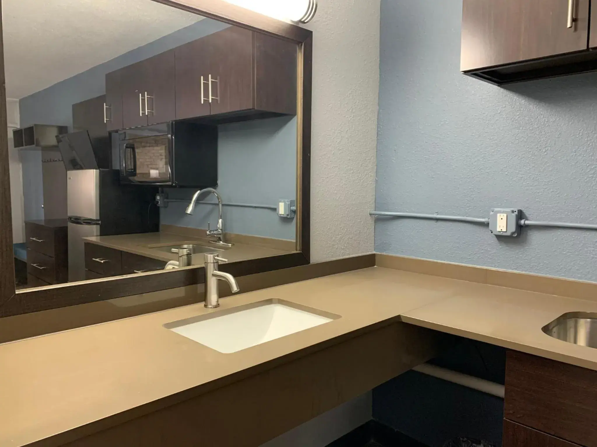 Bedroom in HomeTowne Studios by Red Roof Battle Creek Bedroom in HomeTowne Studios by Red Roof Battle Creek