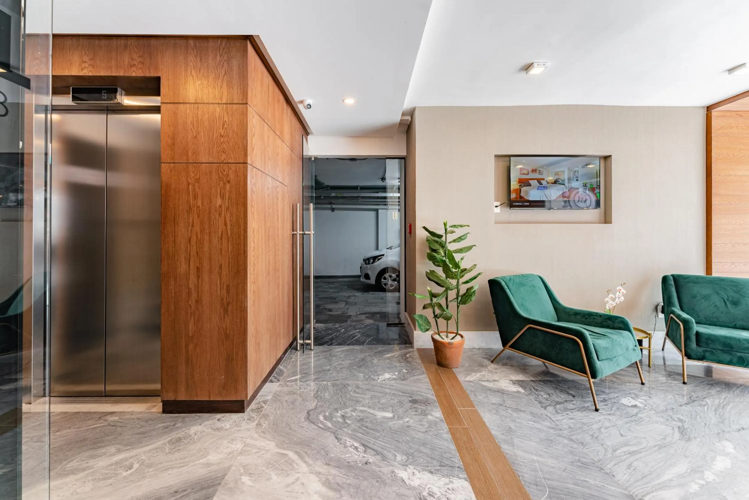 Lobby or reception in Condesa Lofts & Residence Hotel by VH