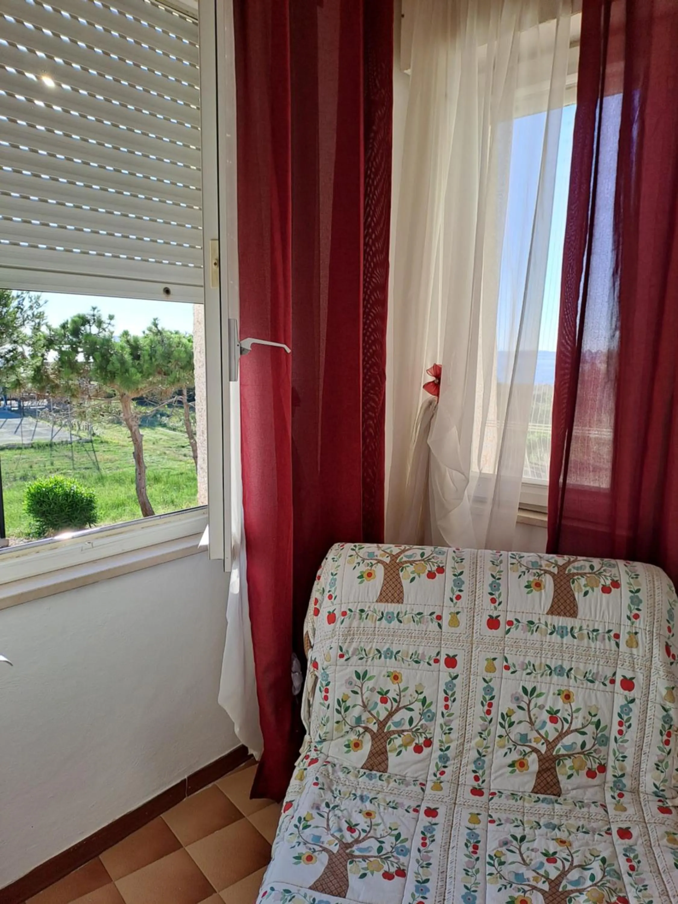 Garden view in Cala di Seta Apartment - Rubino