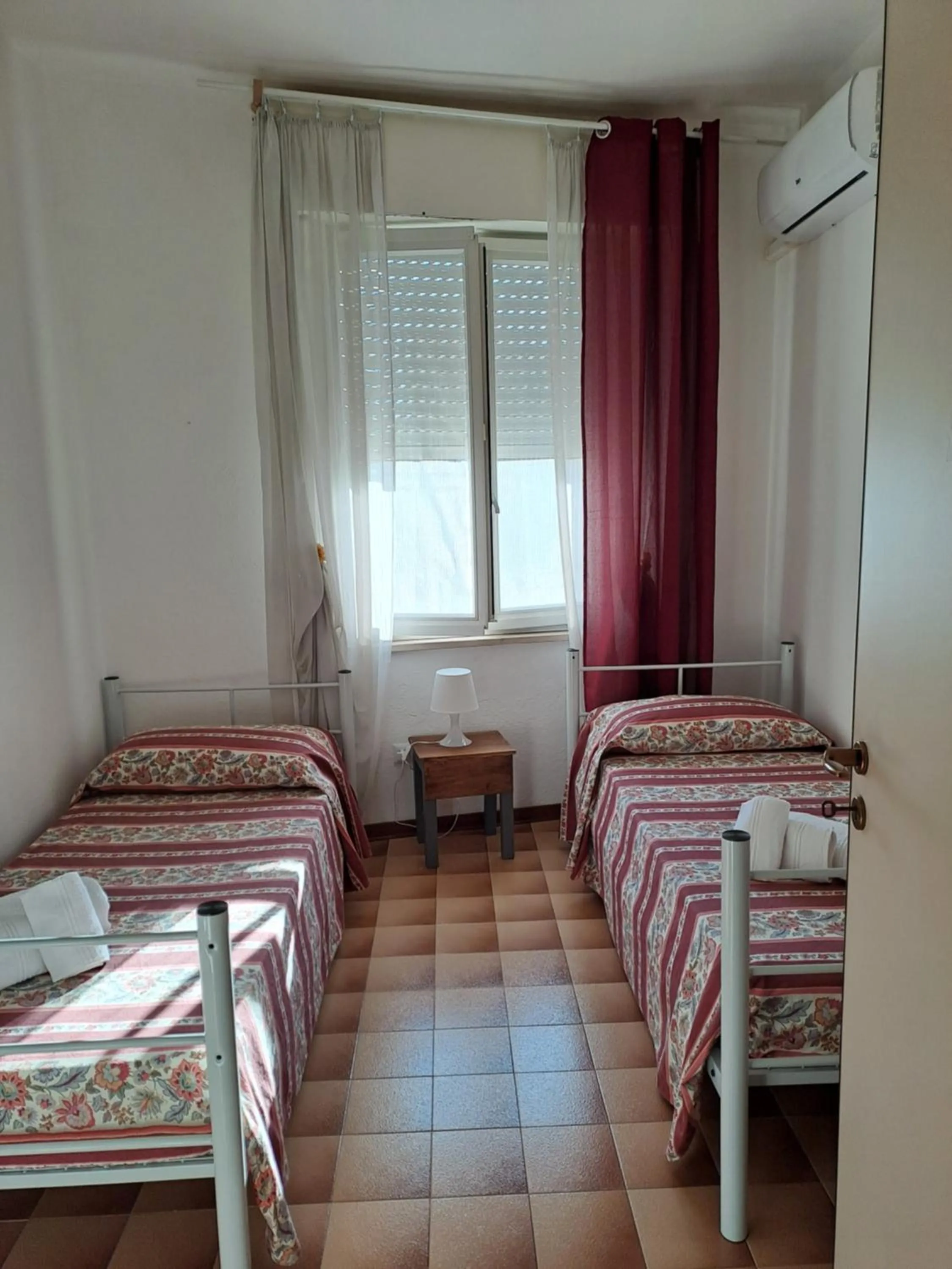 Bedroom in Cala di Seta Apartment - Rubino