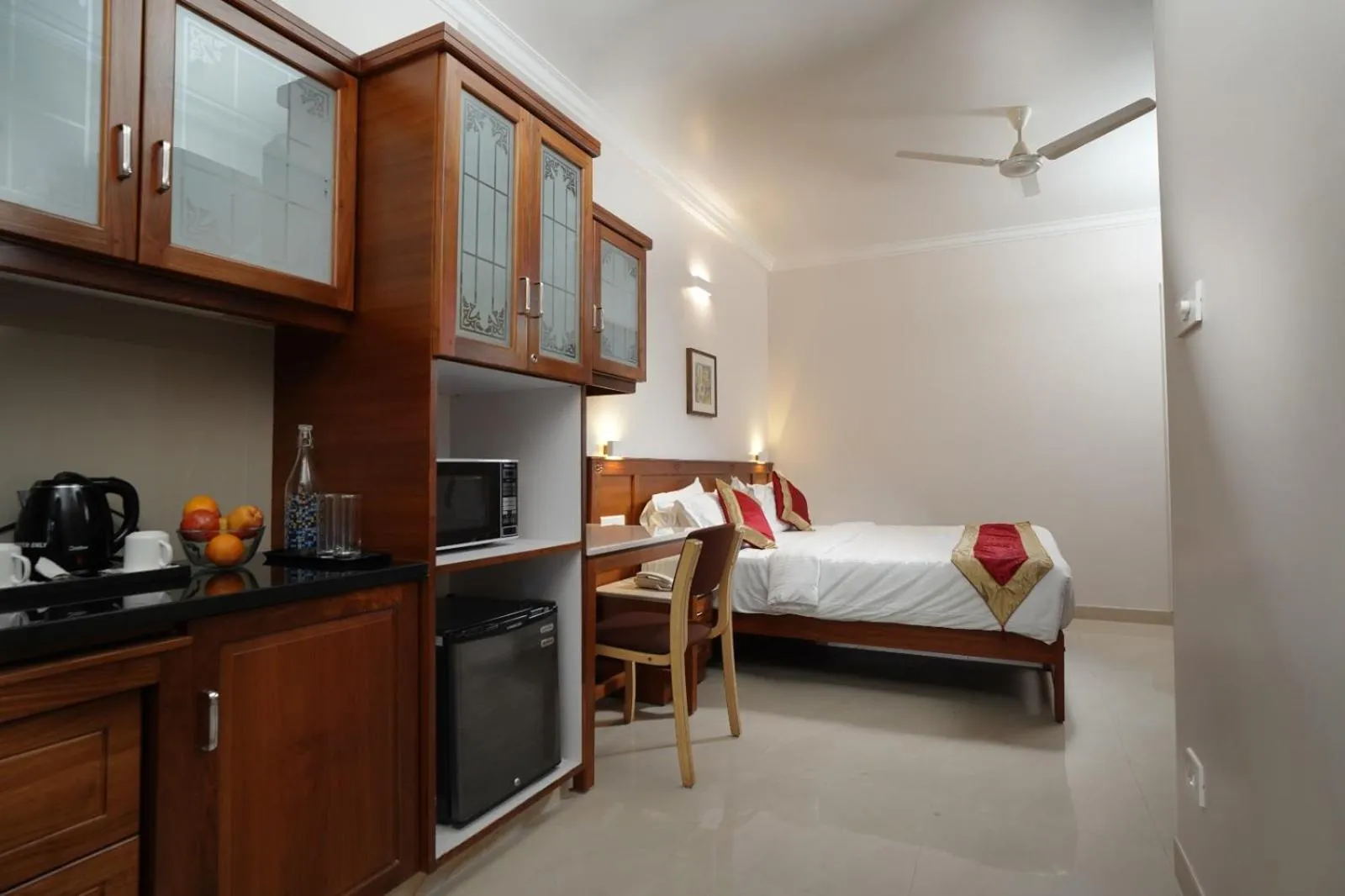 Seating area, Bed in TGR SUITES