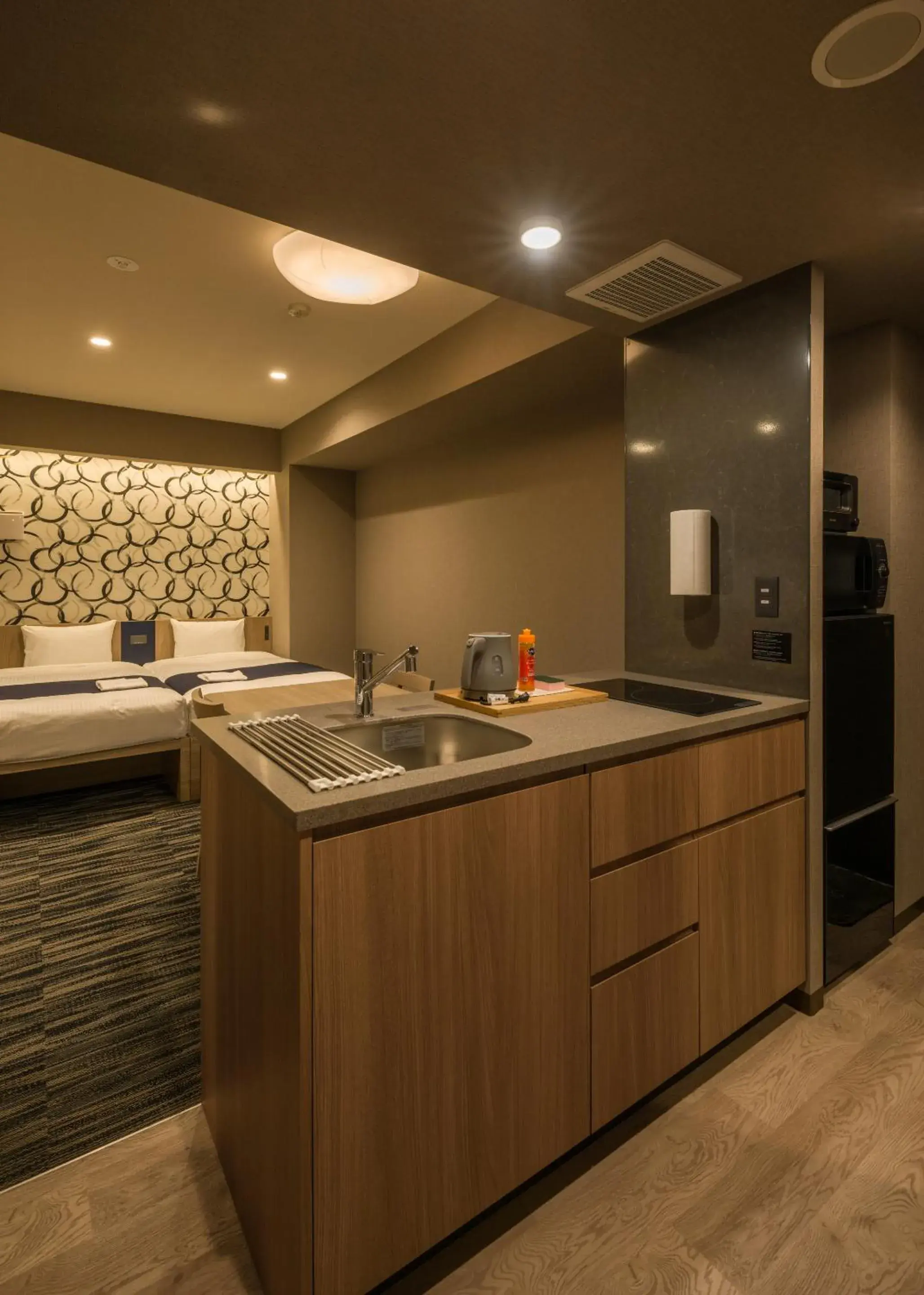 Kitchen or kitchenette, Bed in KOKO HOTEL Residence Asakusa Kappabashi Kitchen or kitchenette, Bed in KOKO HOTEL Residence Asakusa Kappabashi