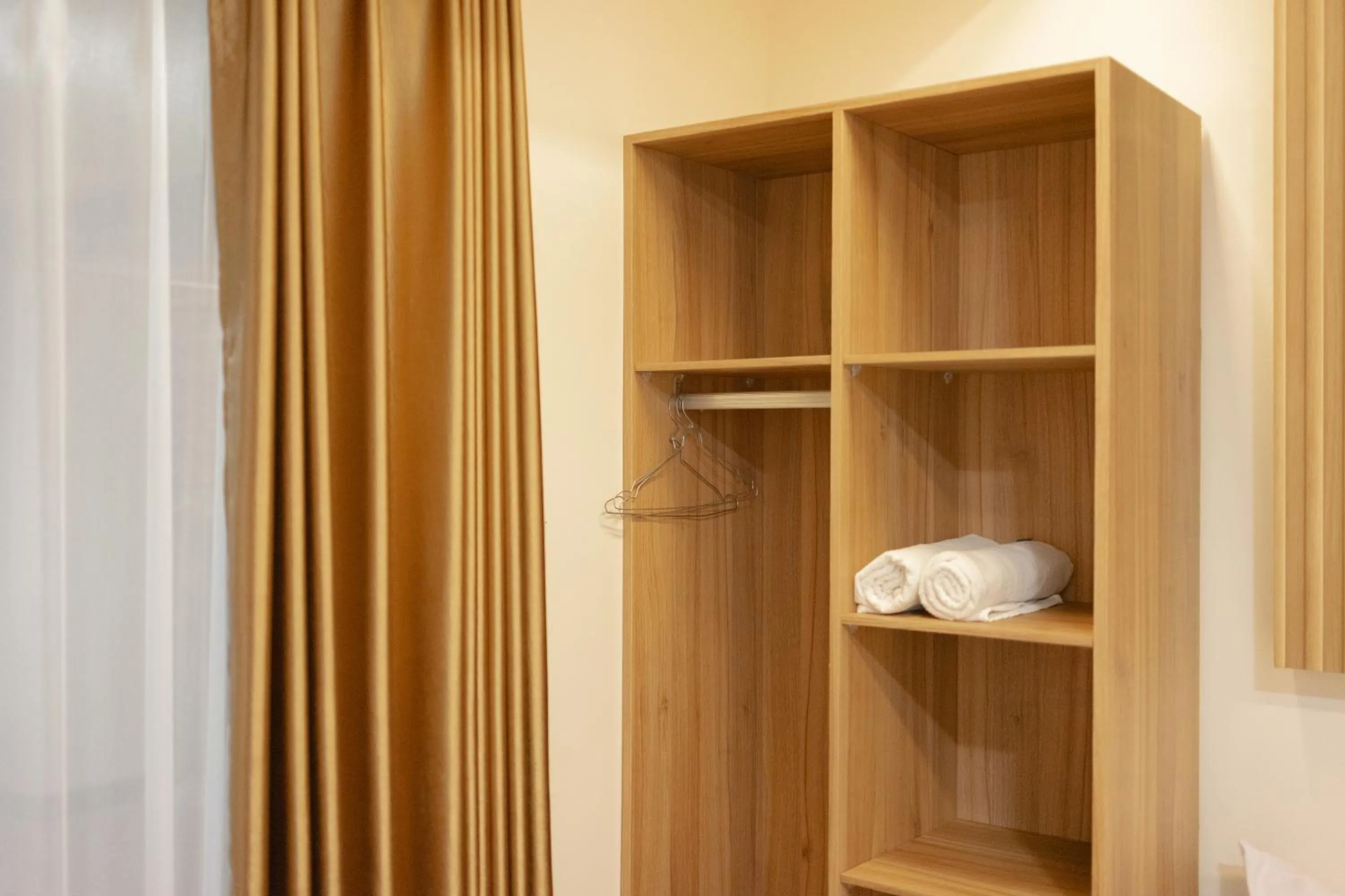 wardrobe in Class Premium Guest House