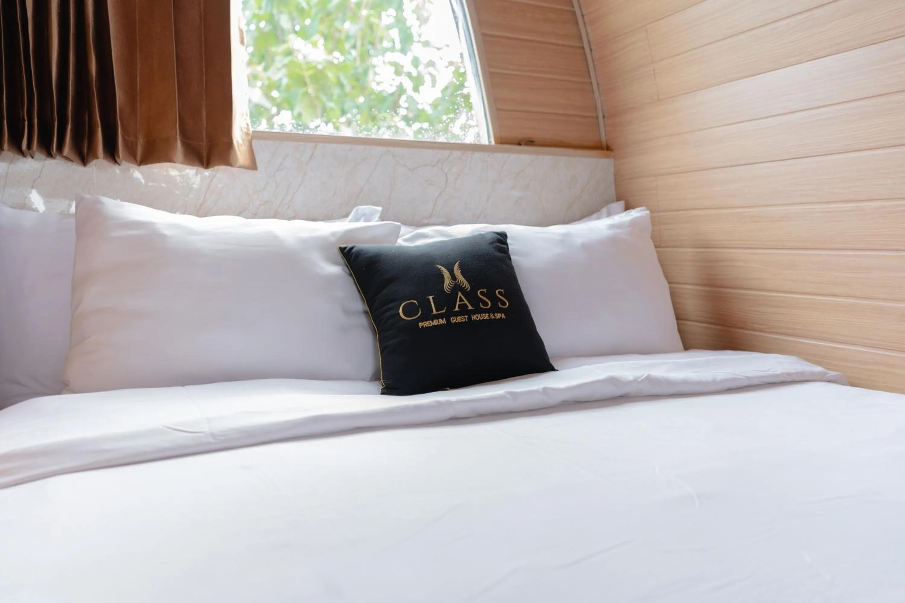 Bed in Class Premium Guest House