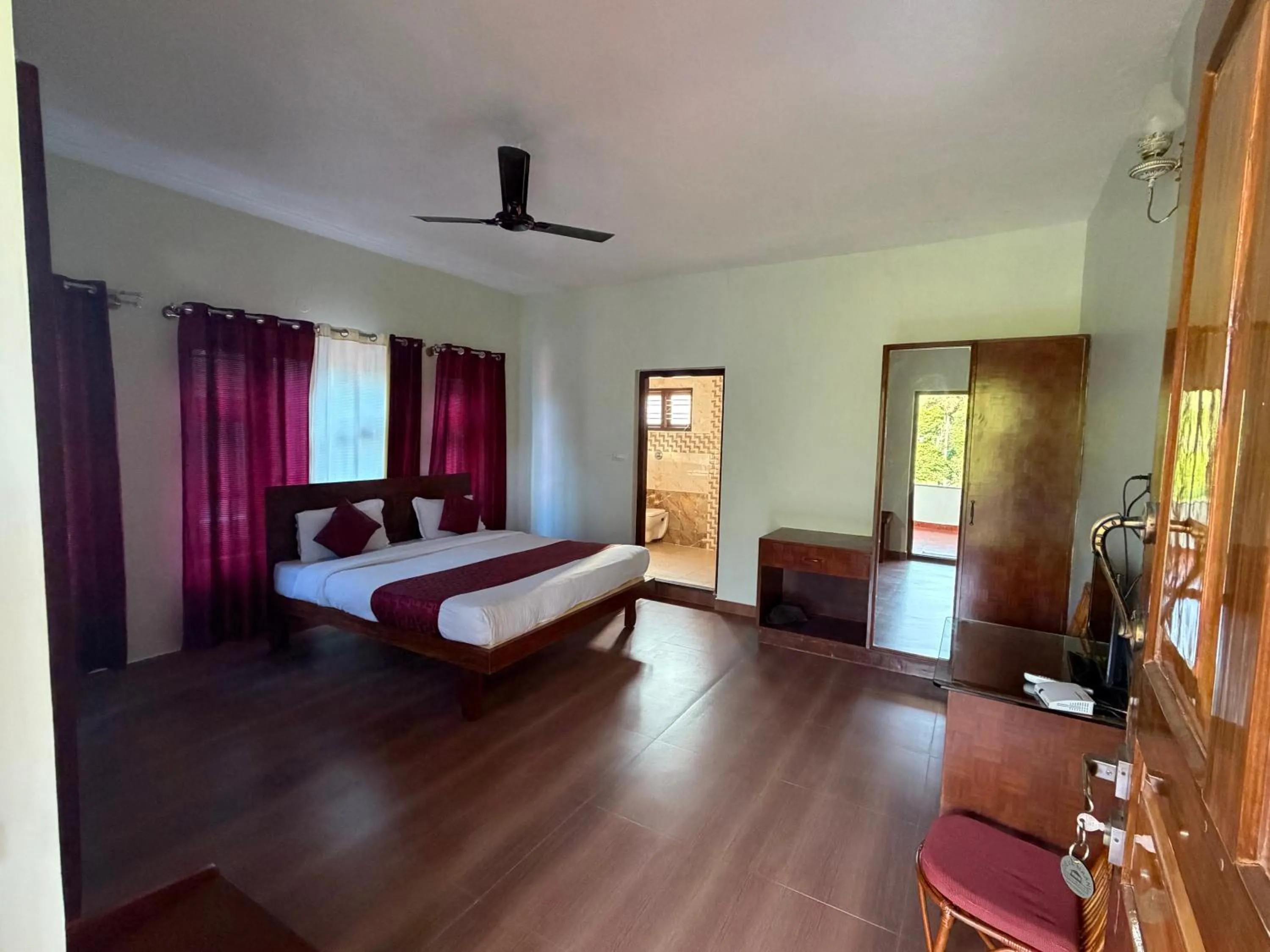 Bed in Deva Maani Coorg Nature View