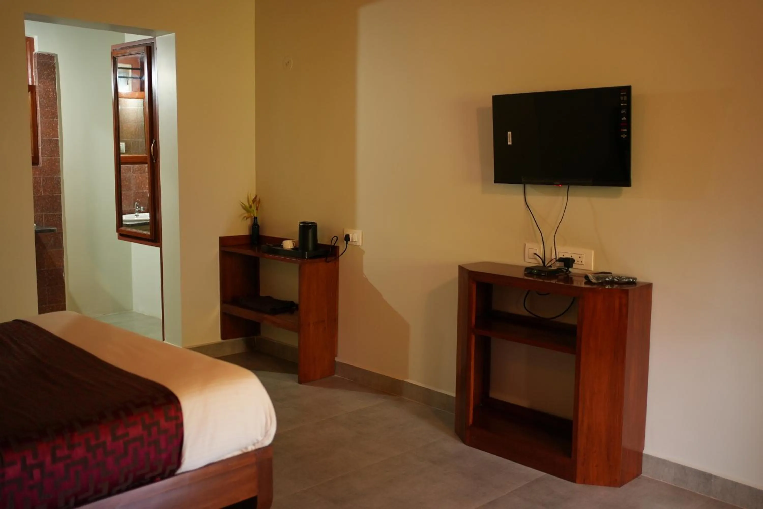 Bed in Deva Maani Coorg Nature View
