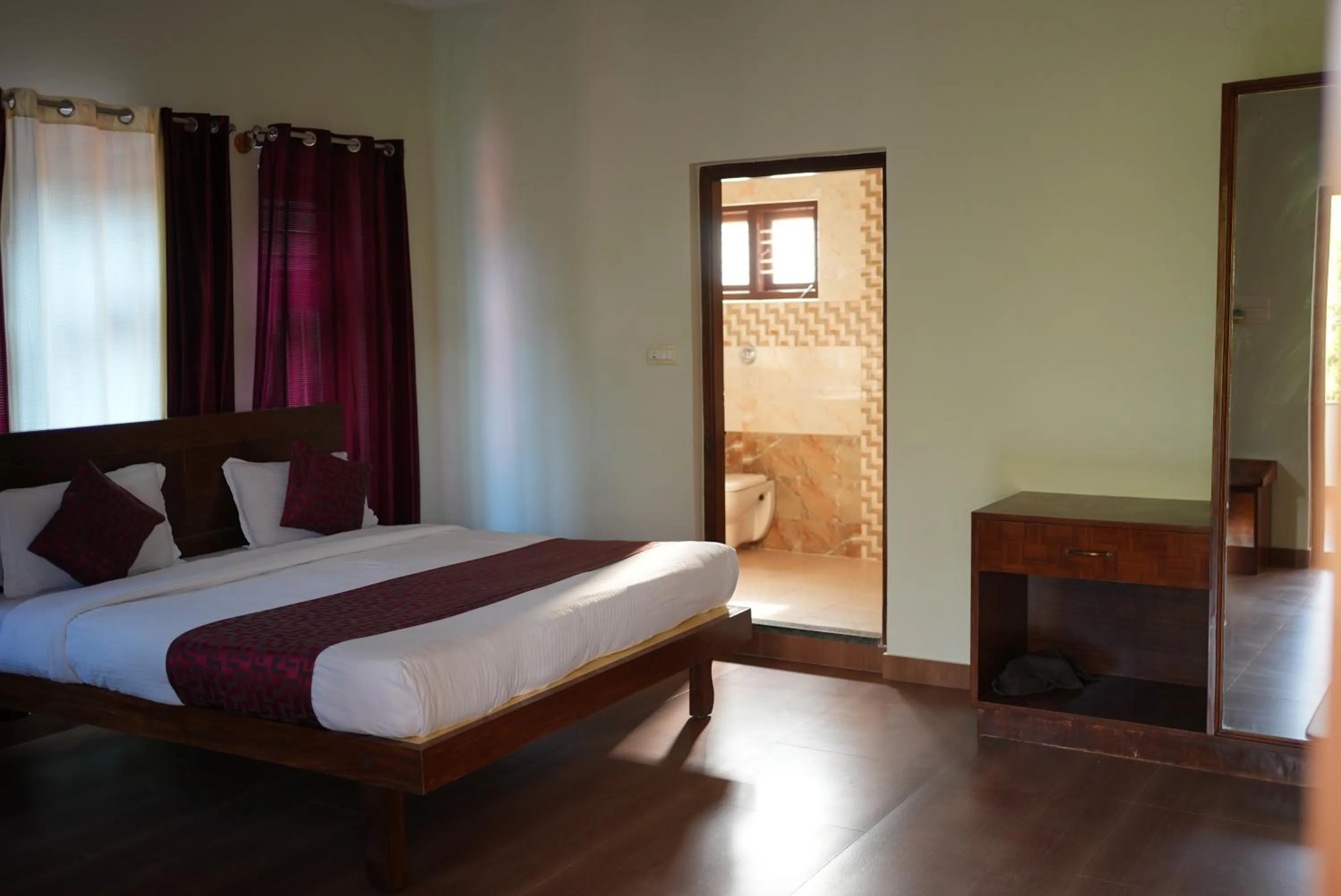 Bed in Deva Maani Coorg Nature View