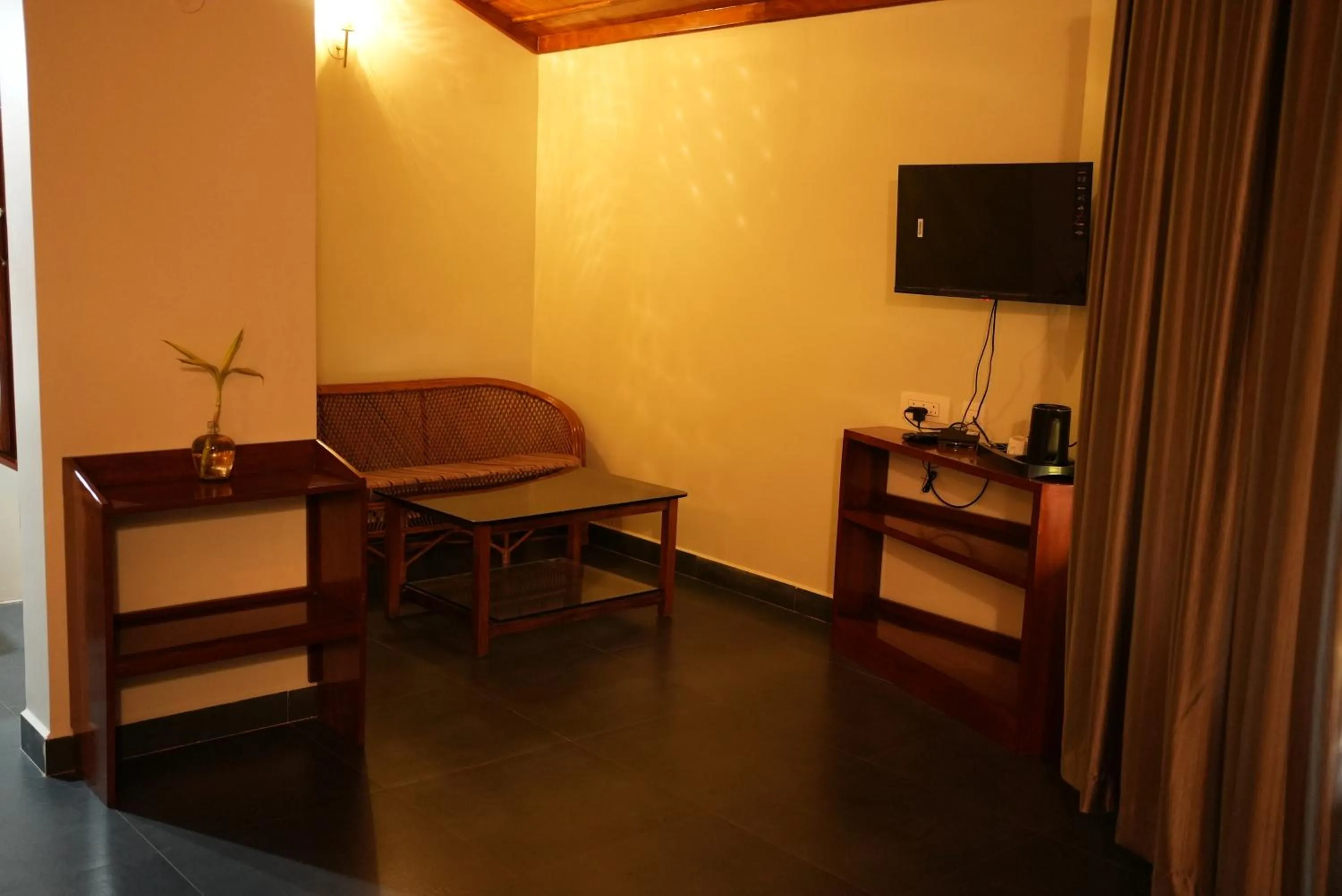 Seating area in Deva Maani Coorg Nature View