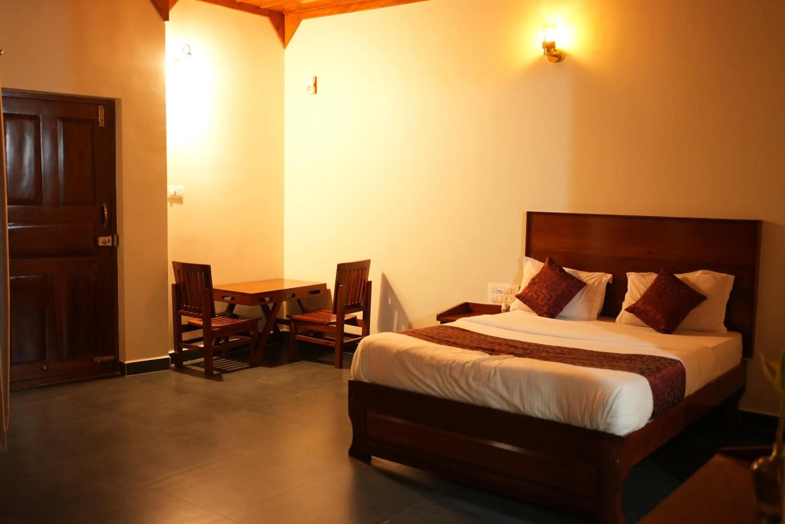 Bed in Deva Maani Coorg Nature View