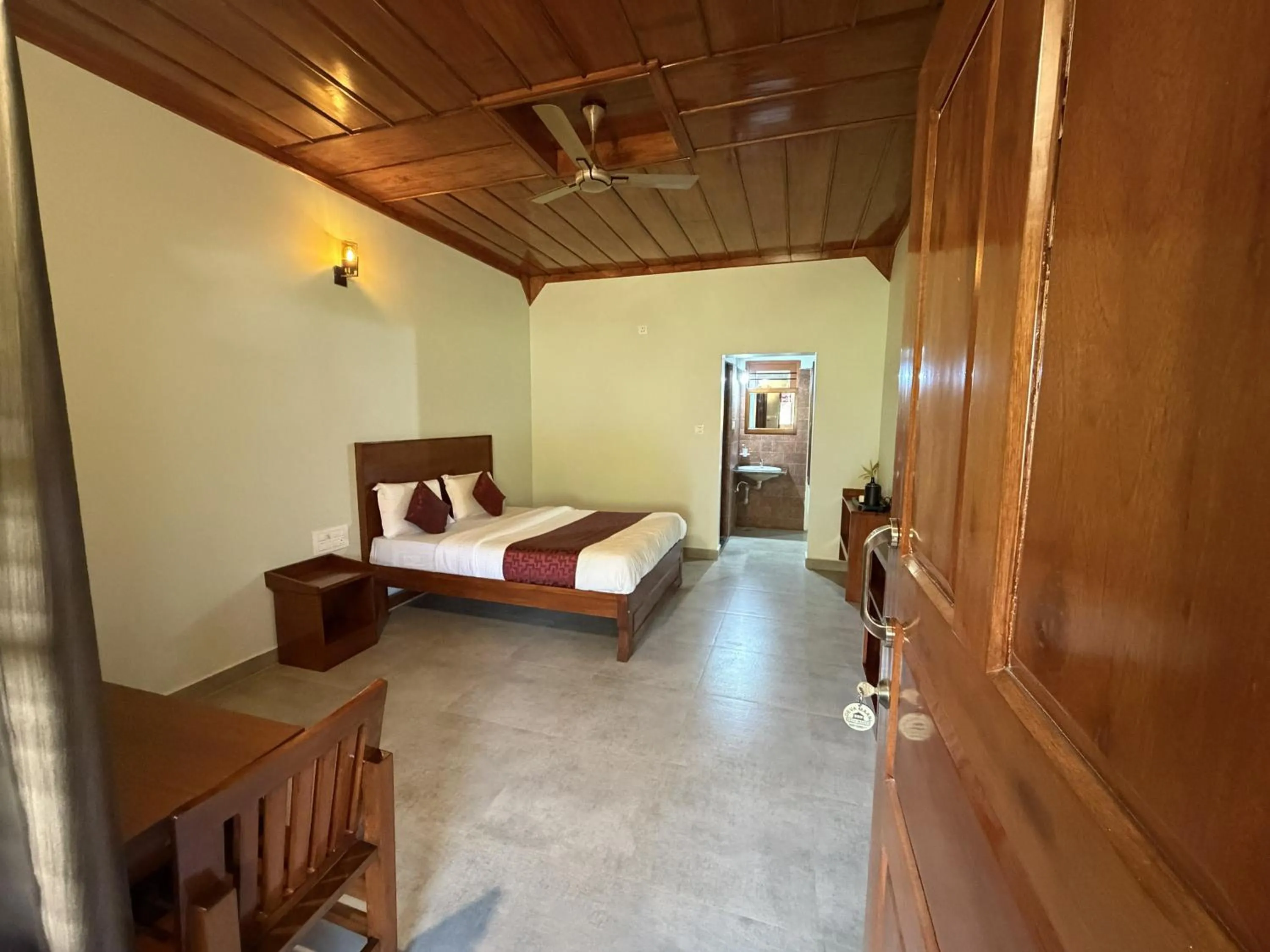 Bed in Deva Maani Coorg Nature View