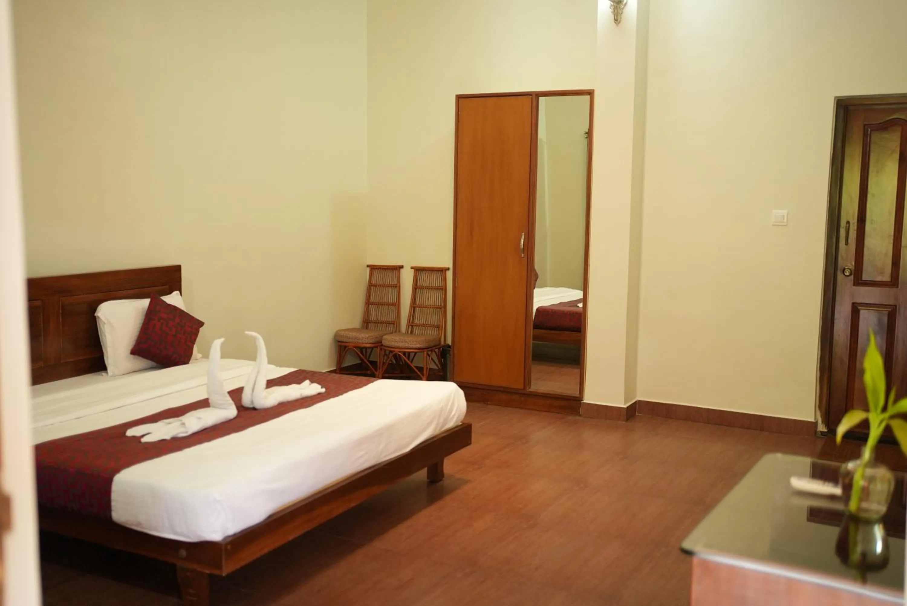 Bed in Deva Maani Coorg Nature View