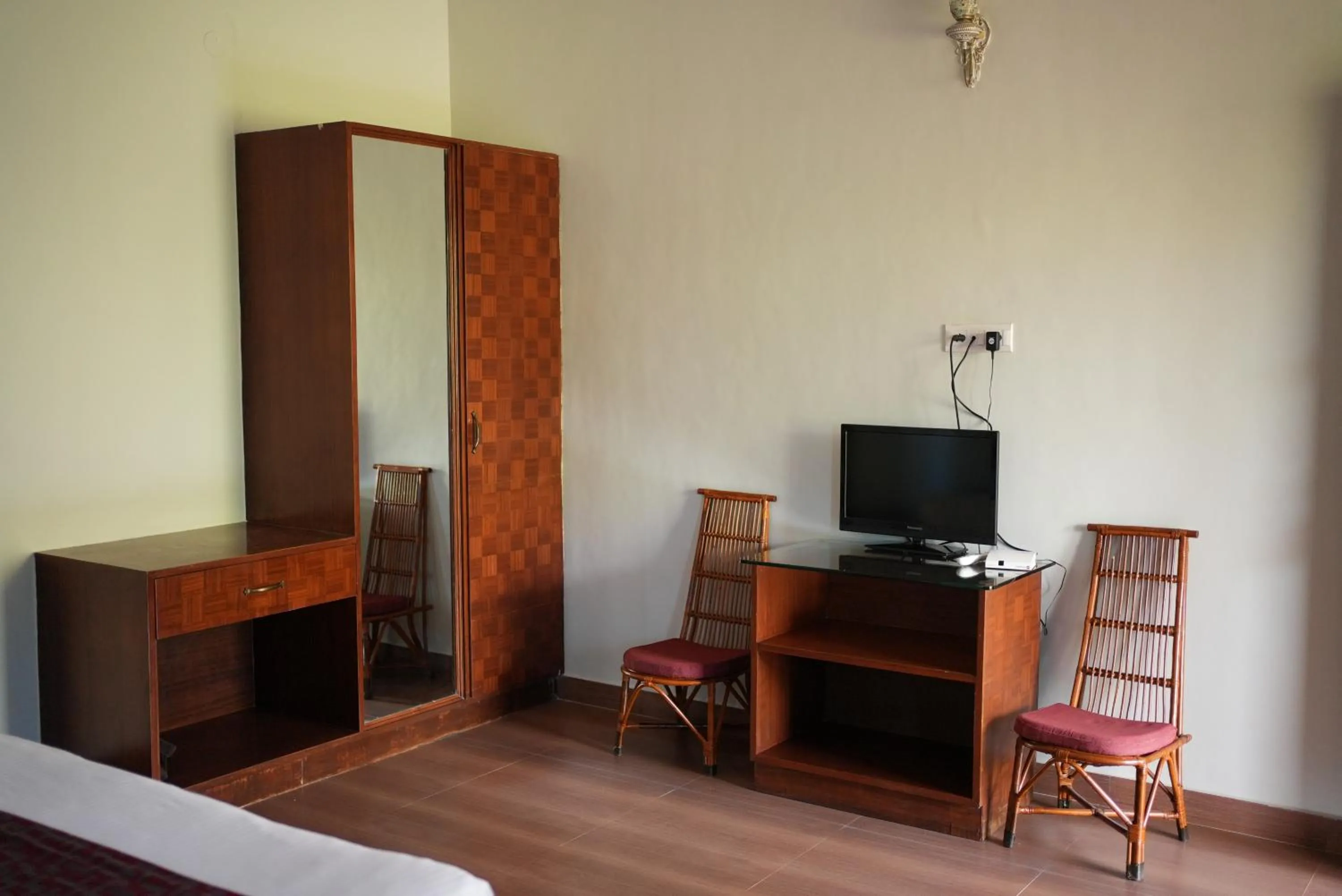 Communal lounge/ TV room in Deva Maani Coorg Nature View