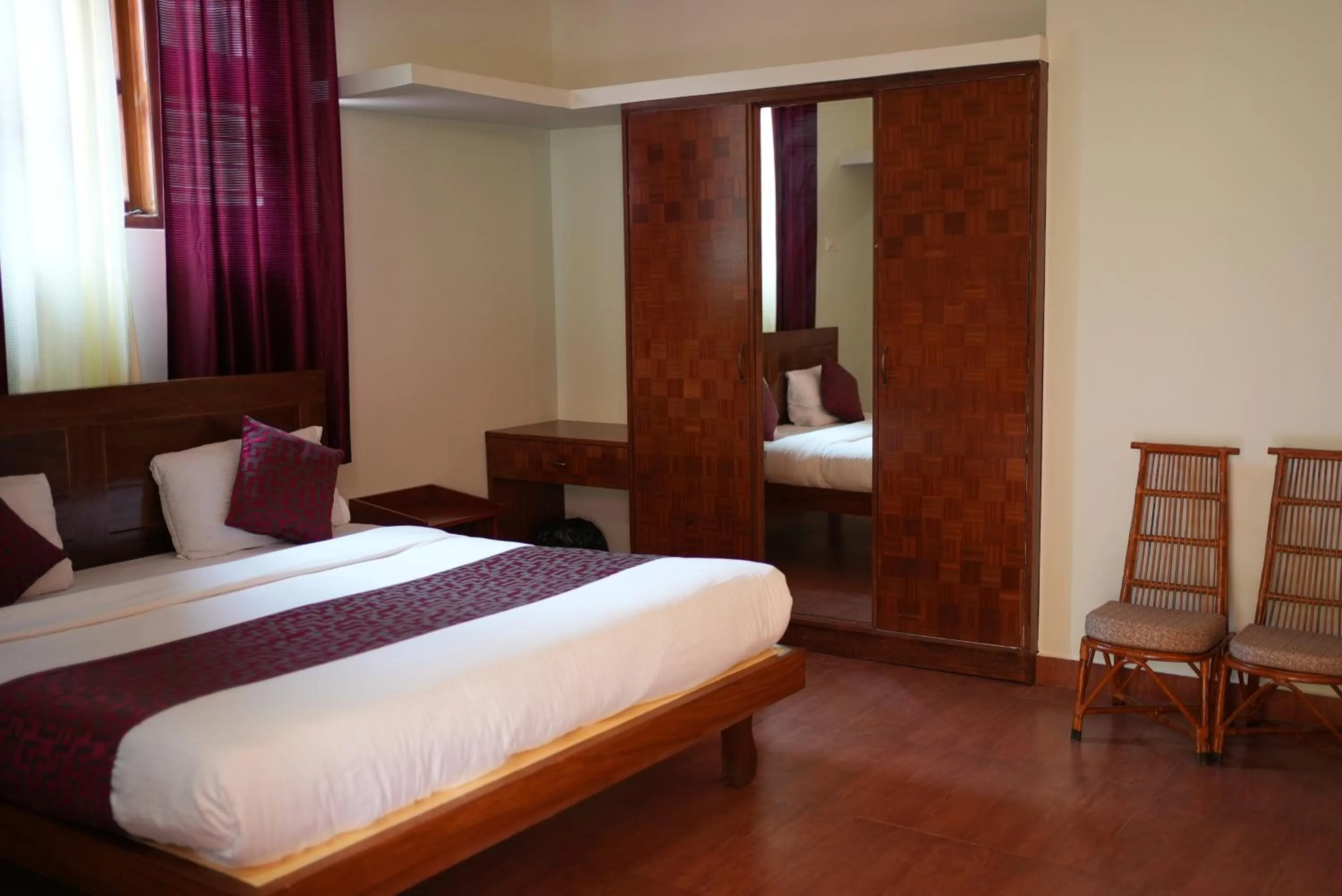 Bed in Deva Maani Coorg Nature View