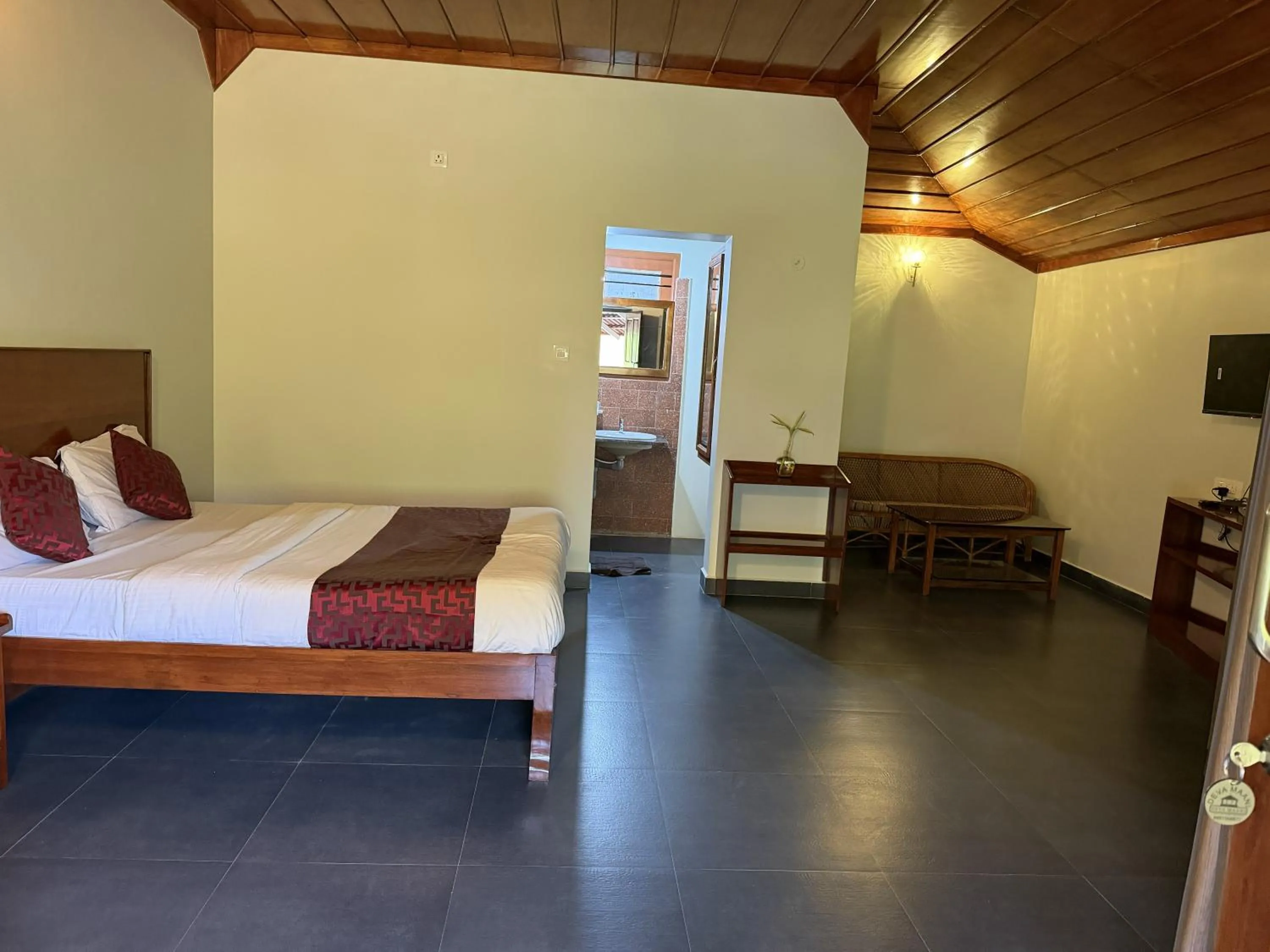 Bed in Deva Maani Coorg Nature View