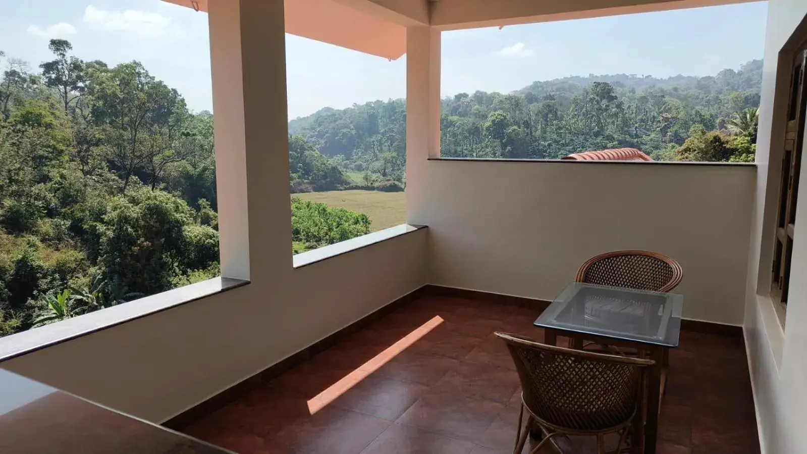 Deluxe Double Room with Balcony in Deva Maani Coorg Nature View Deluxe Double Room with Balcony in Deva Maani Coorg Nature View