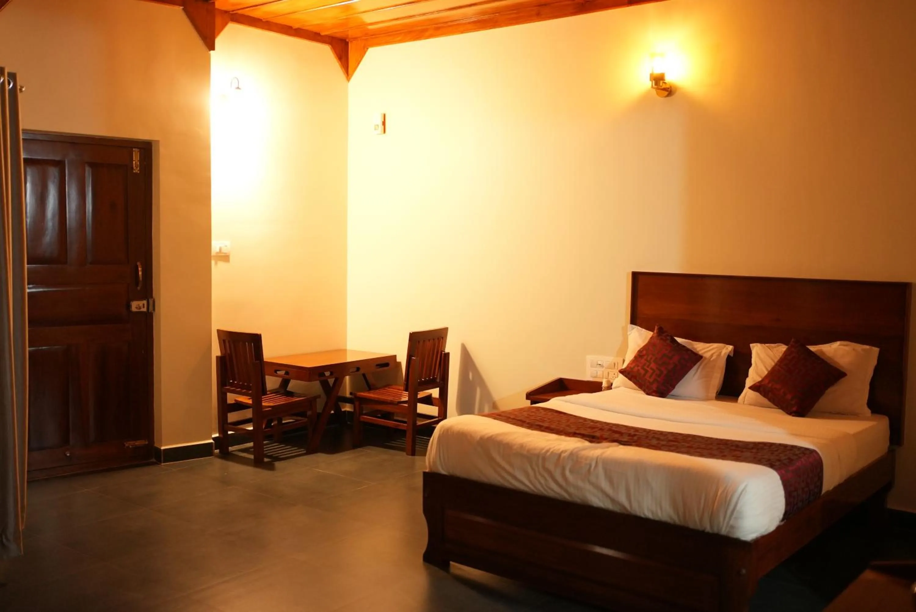 Bed in Deva Maani Coorg Nature View