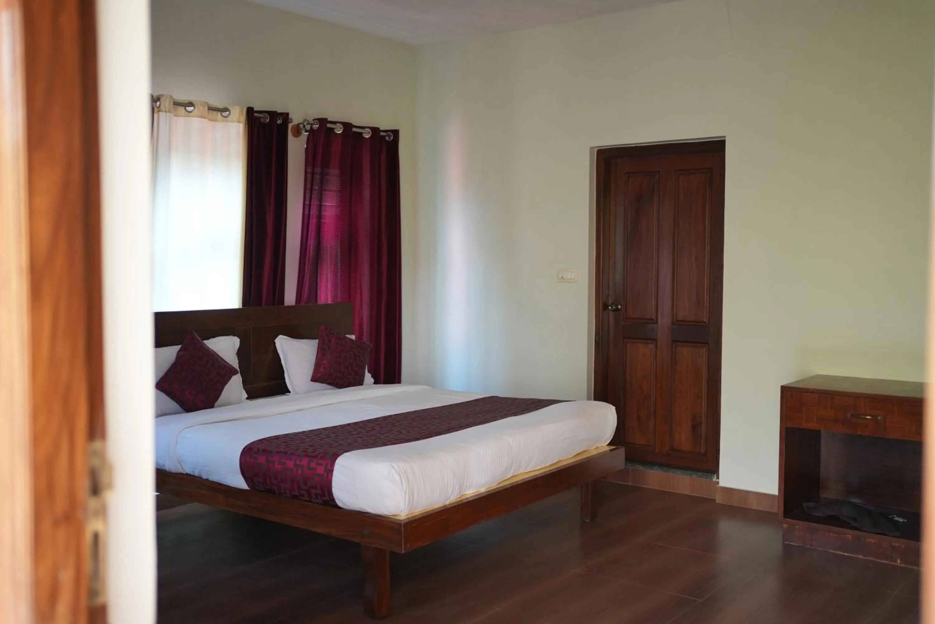 Bed in Deva Maani Coorg Nature View