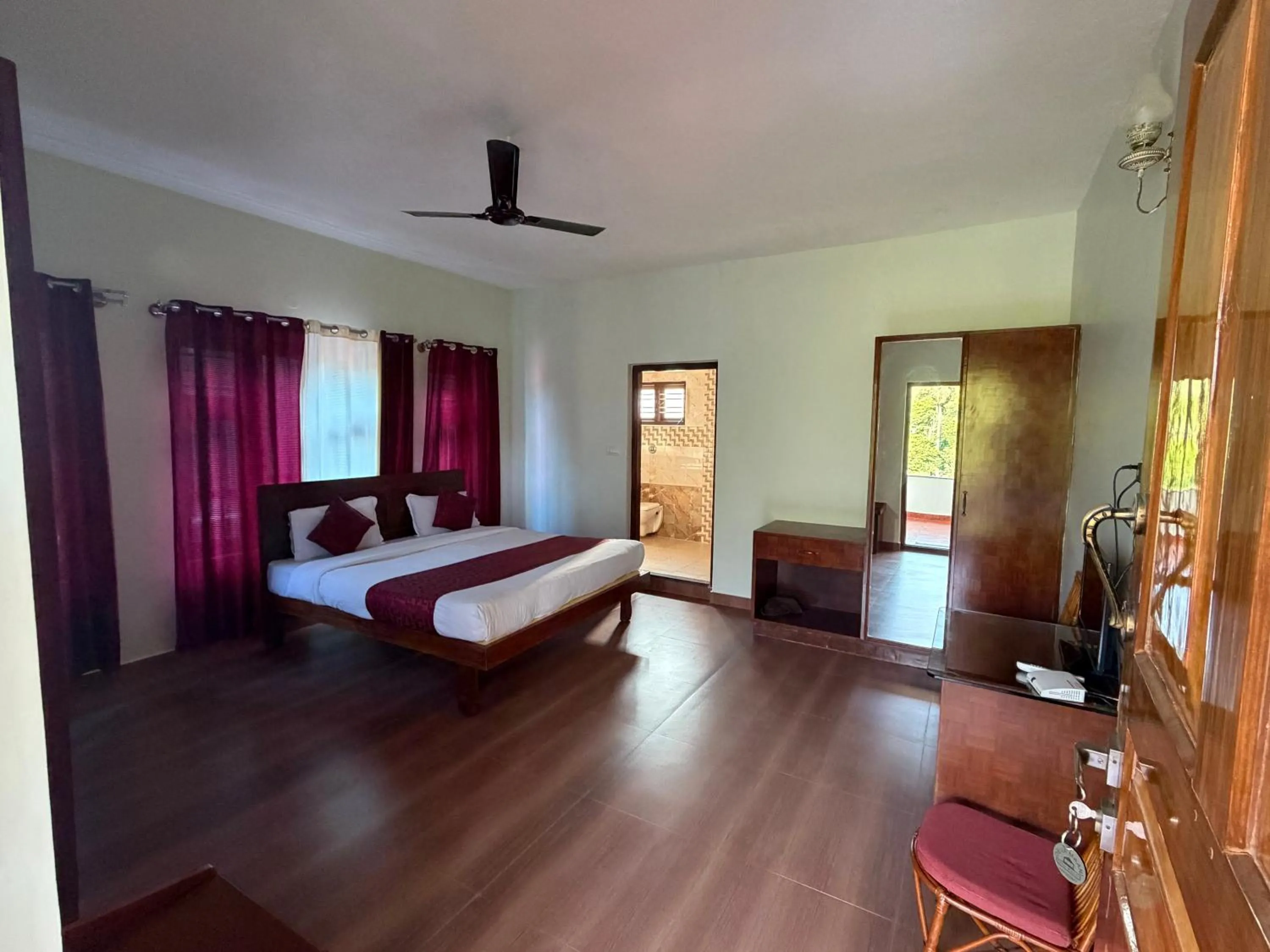 Bed in Deva Maani Coorg Nature View