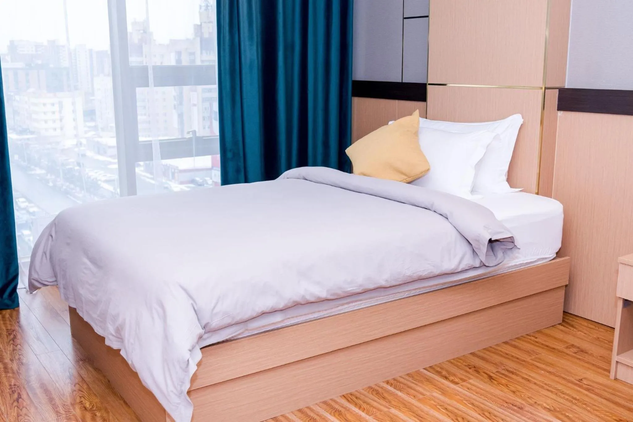 Bed in MIllennium Plaza Hotel & Mall Ulaanbaatar