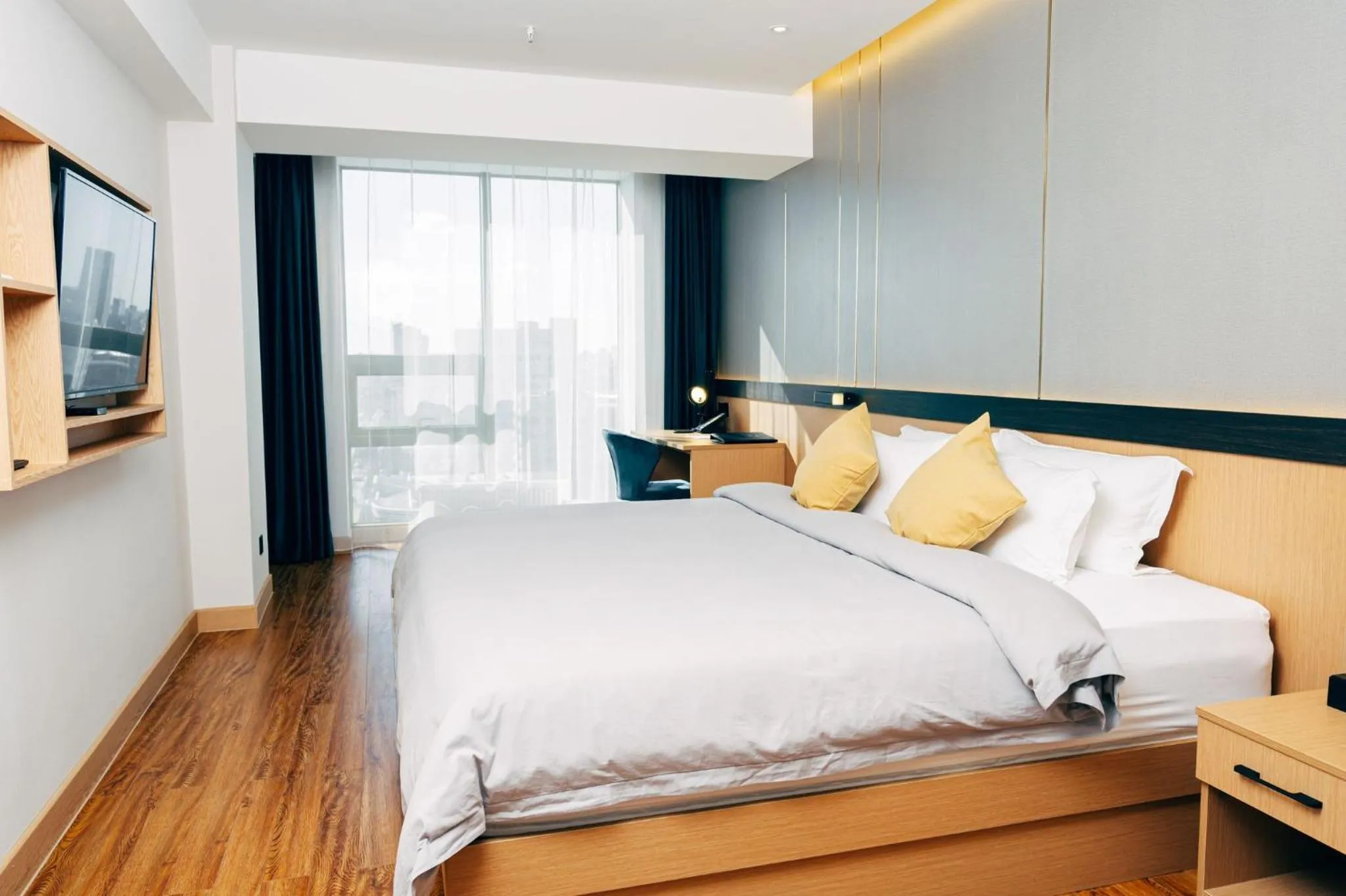 Bed in MIllennium Plaza Hotel & Mall Ulaanbaatar