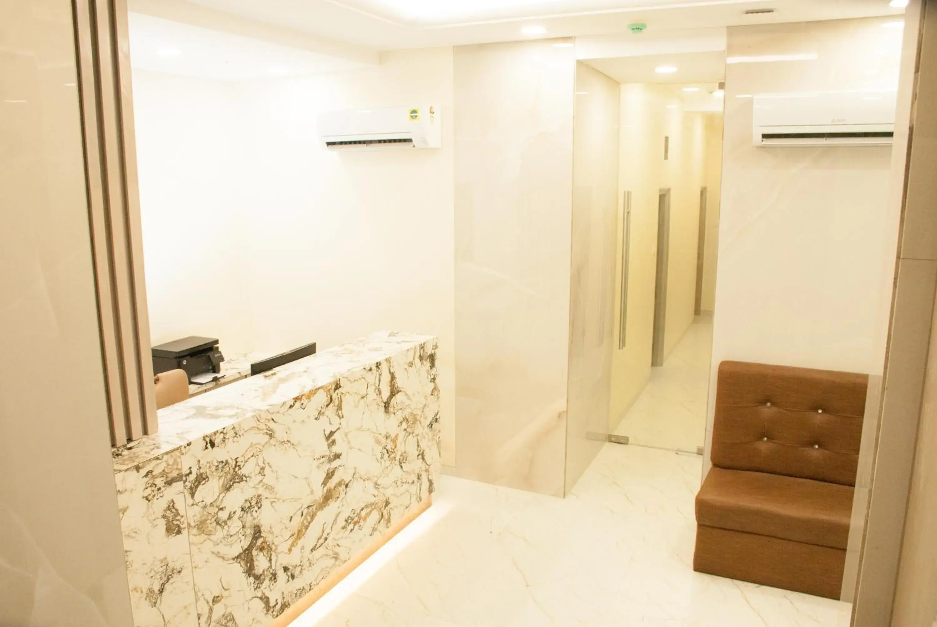 Lobby or reception in City Hotel Lobby or reception in City Hotel