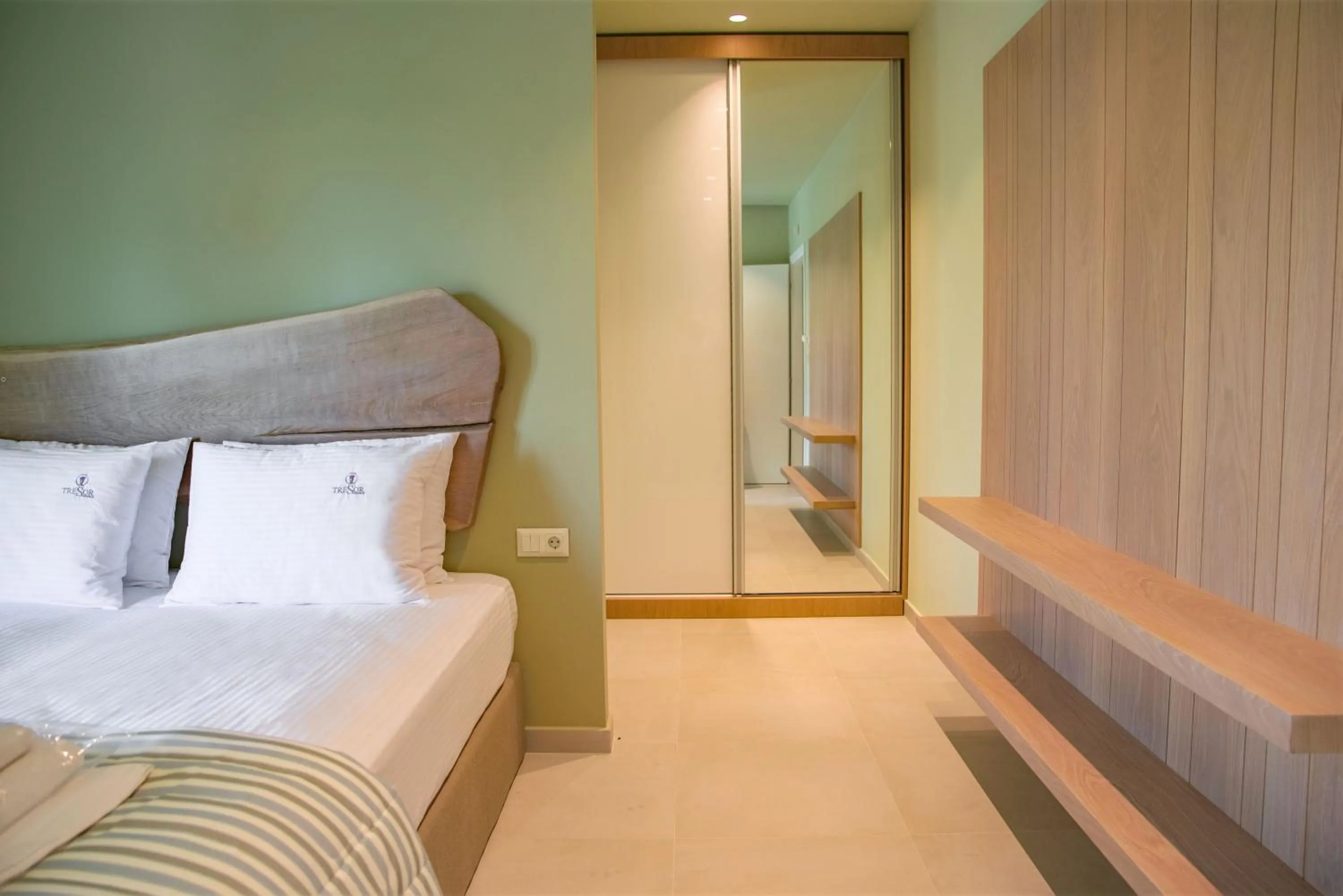 Photo of the whole room, Bed in Tresor Sousouras