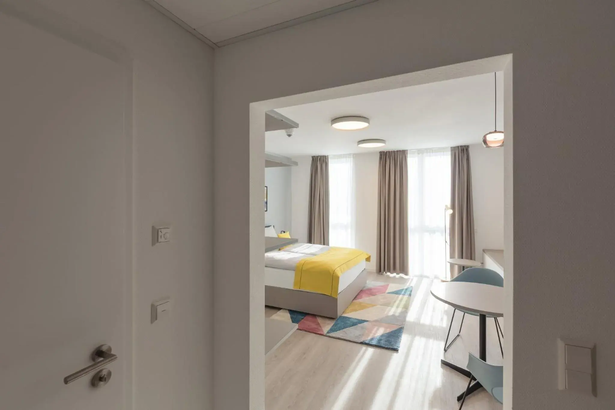 Photo of the whole room, Bed in Candlewood Suites Heidelberg by IHG Photo of the whole room, Bed in Candlewood Suites Heidelberg by IHG