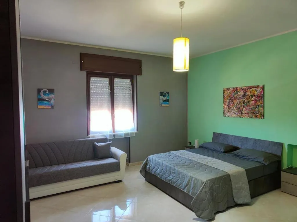 Bed in B&B PERNA Panoramic Rooms