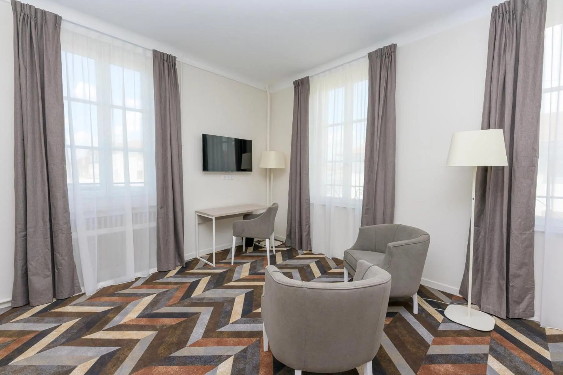 Seating area in Logis HOTEL DU PARC