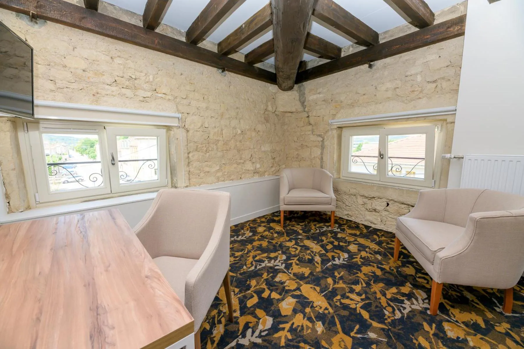 Seating area in Logis HOTEL DU PARC