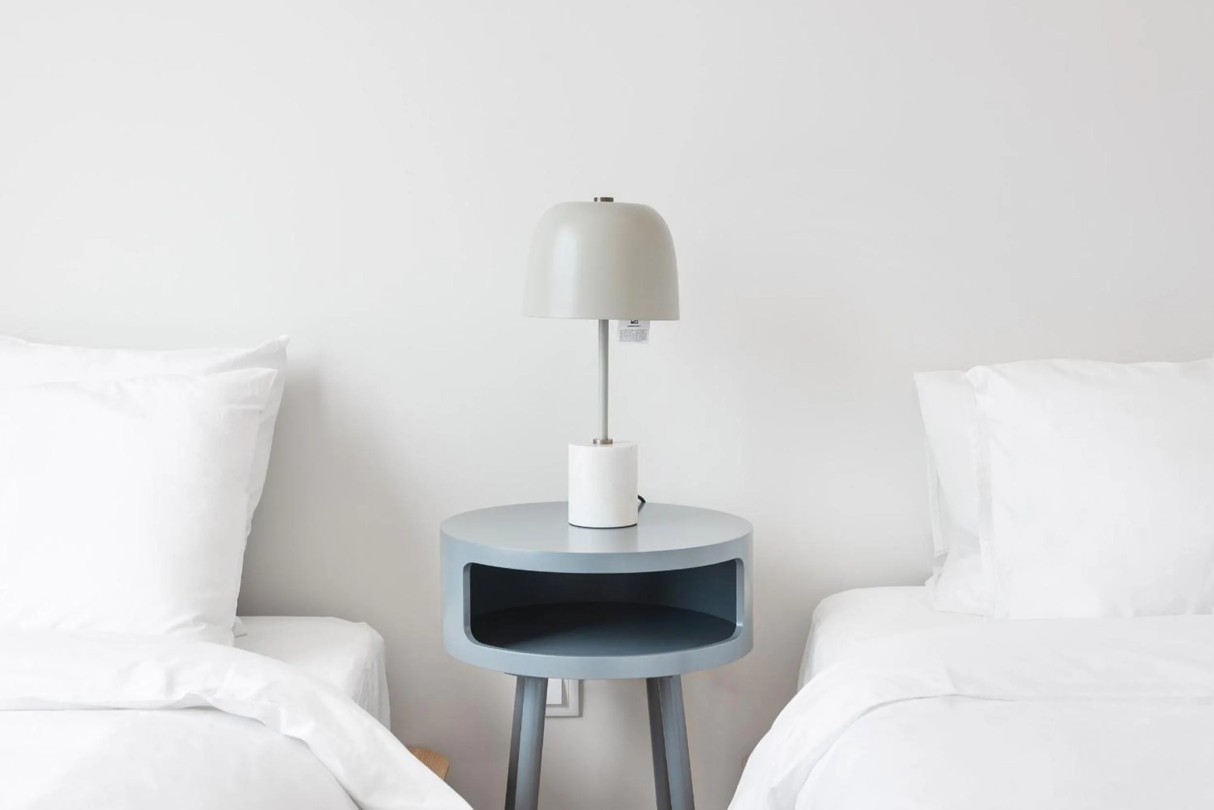Bed in Ocean Apartment by Olala Homes