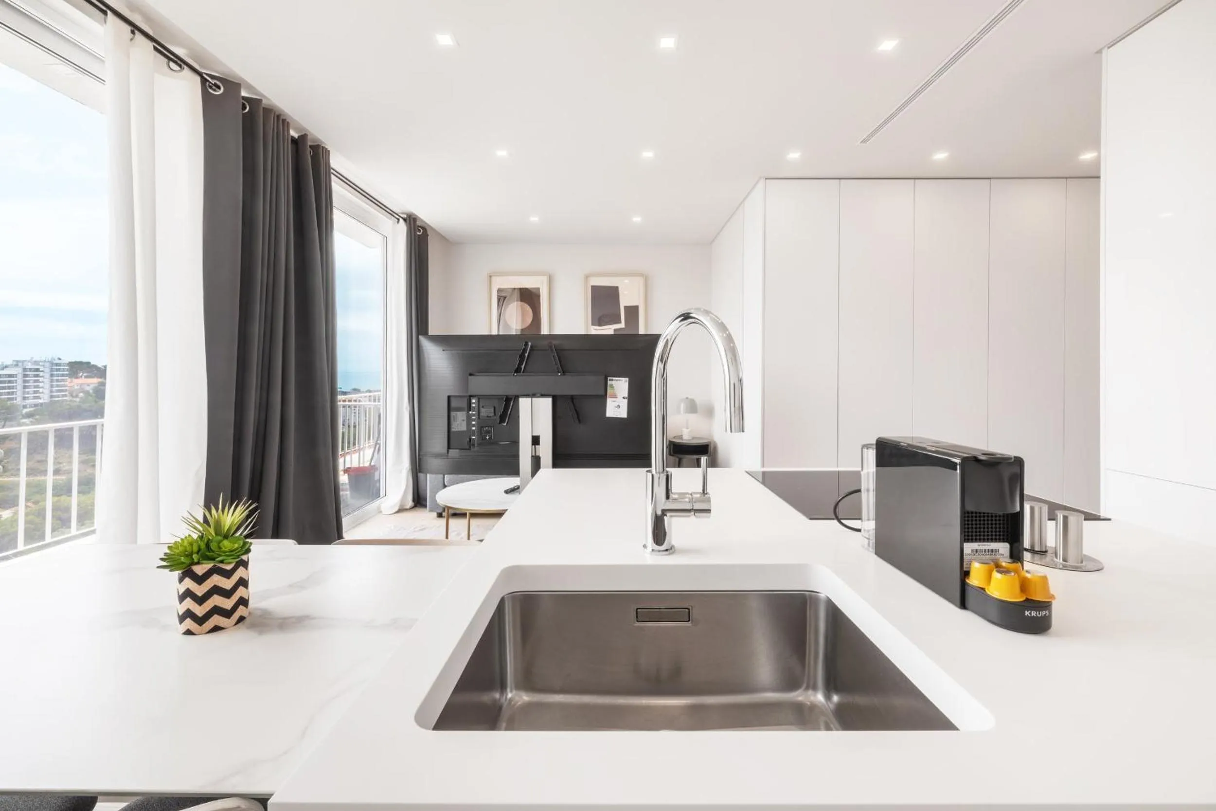 kitchen in Ocean Apartment by Olala Homes