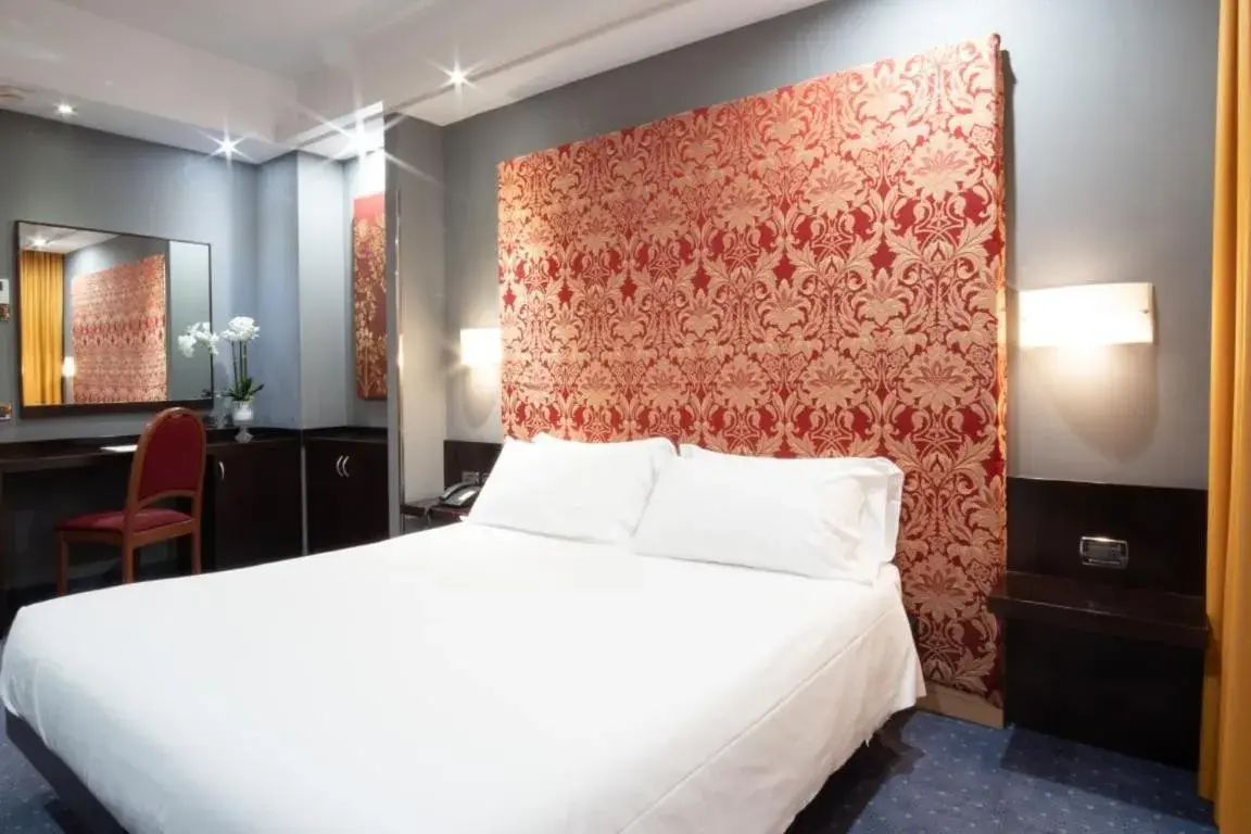 Bed in Hotel IMPERATORI Bed in Hotel IMPERATORI