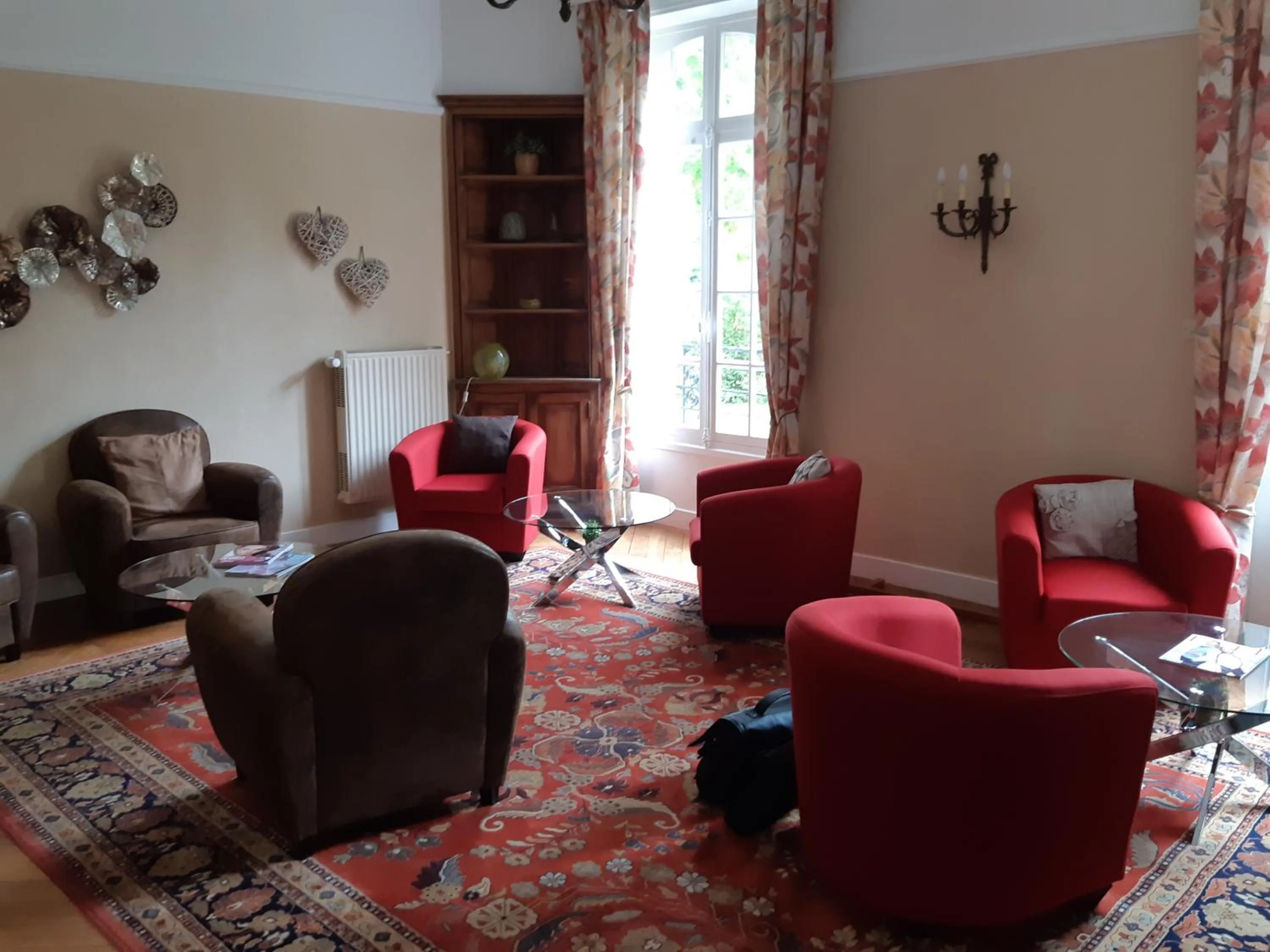 Living room in Logis Hôtel Restaurant Le Parc