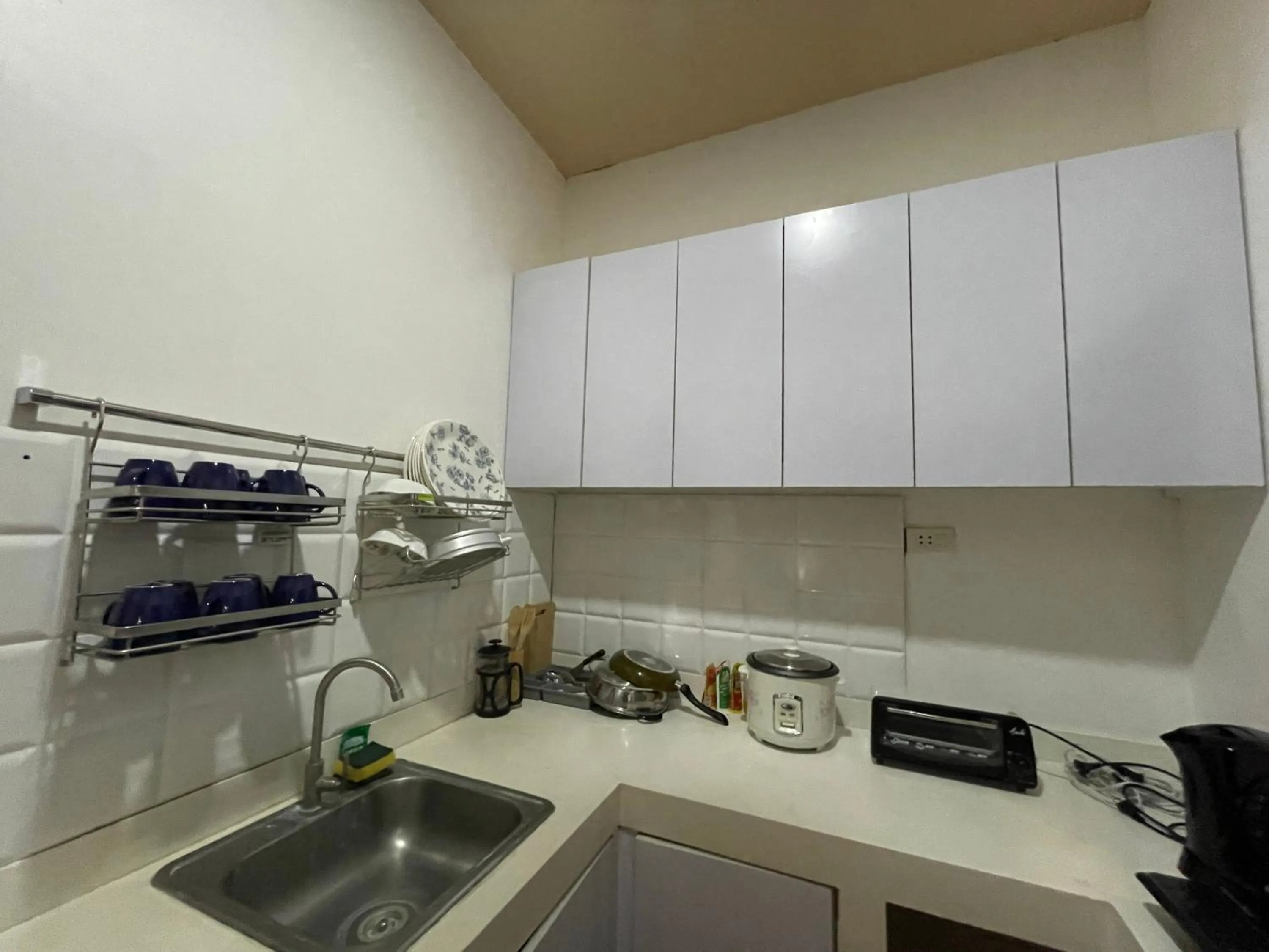 Kitchen or kitchenette in Sto Niño Residences Lucena City