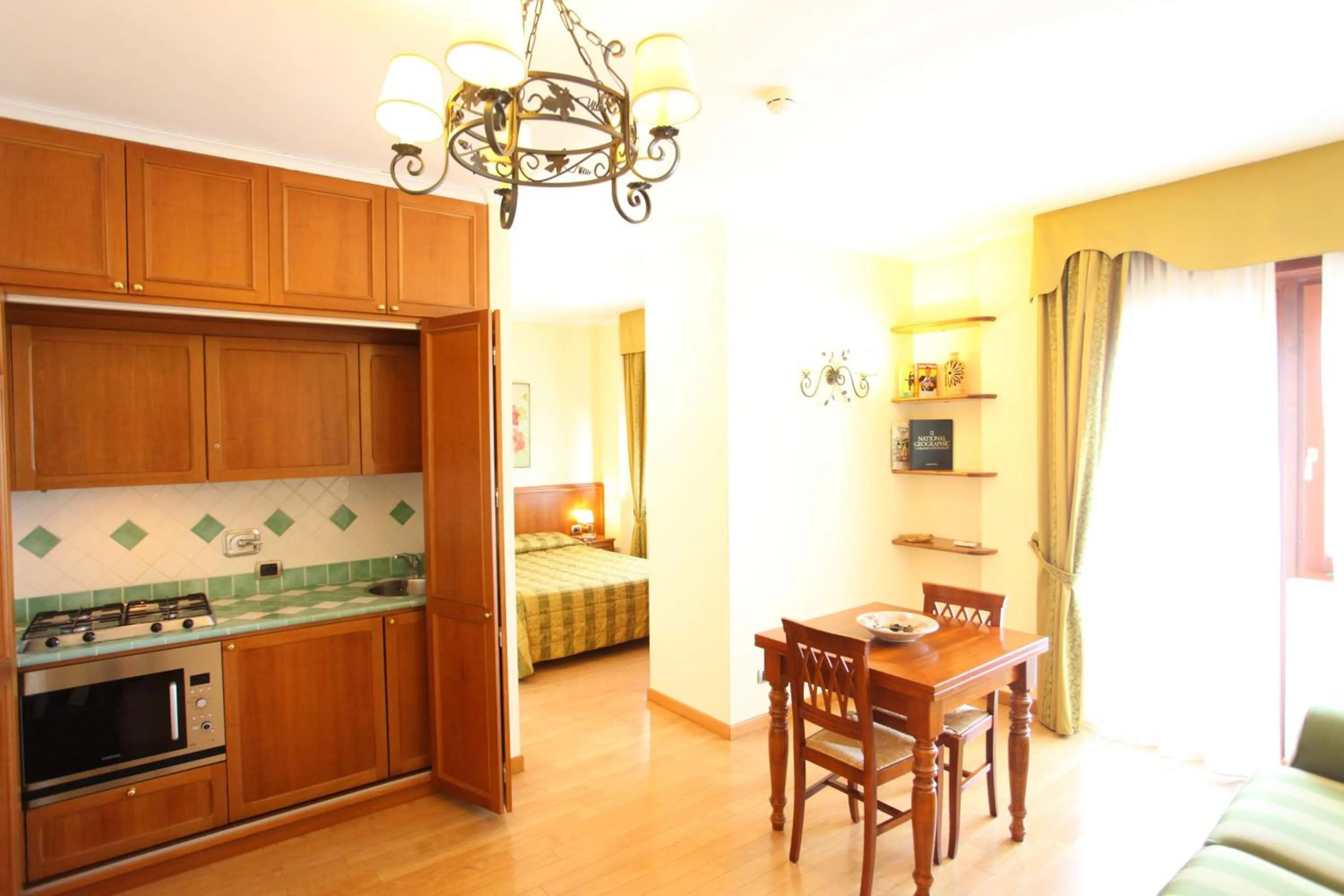 Kitchen or kitchenette in Altea Suites