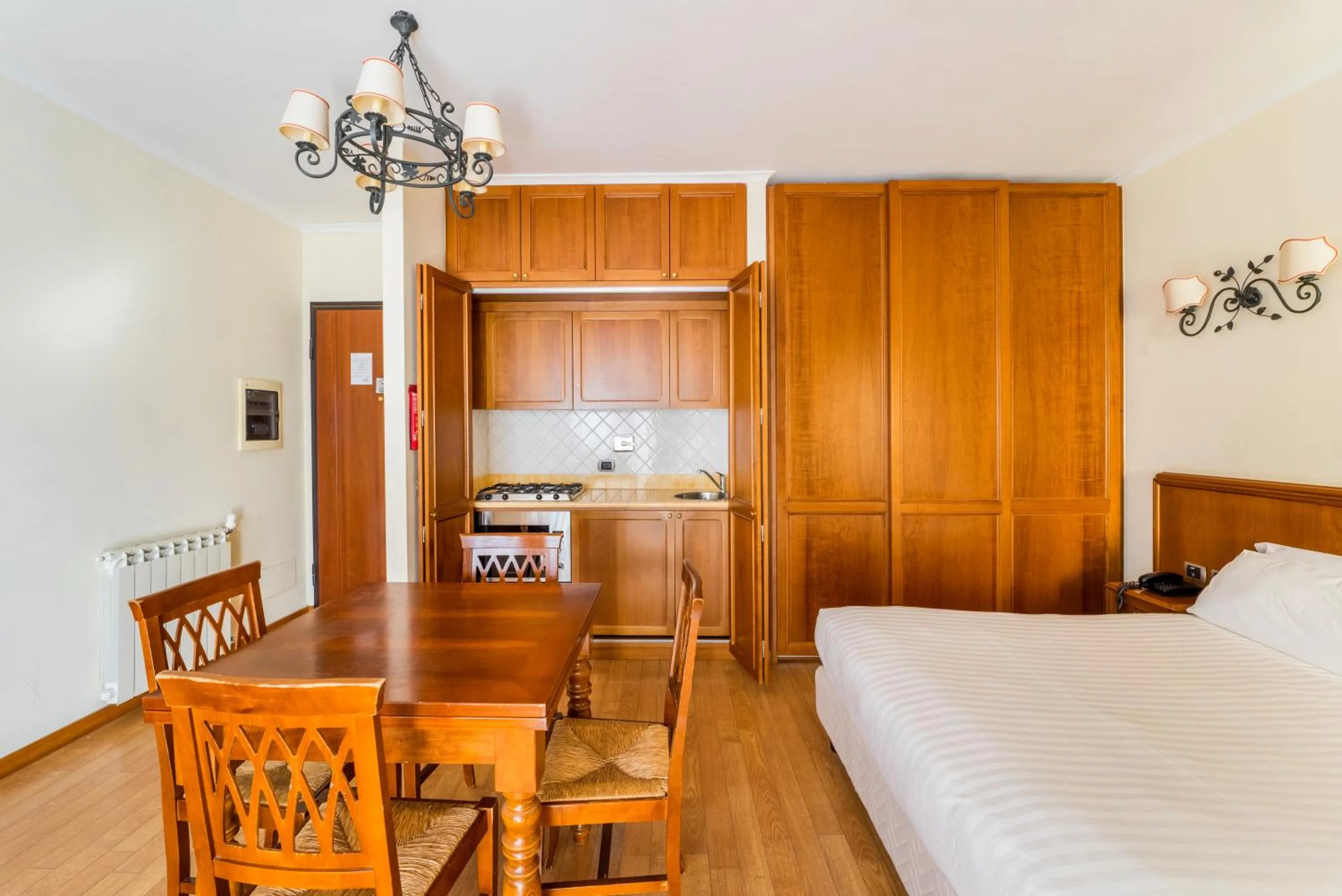 Kitchen or kitchenette, Bed in Altea Suites