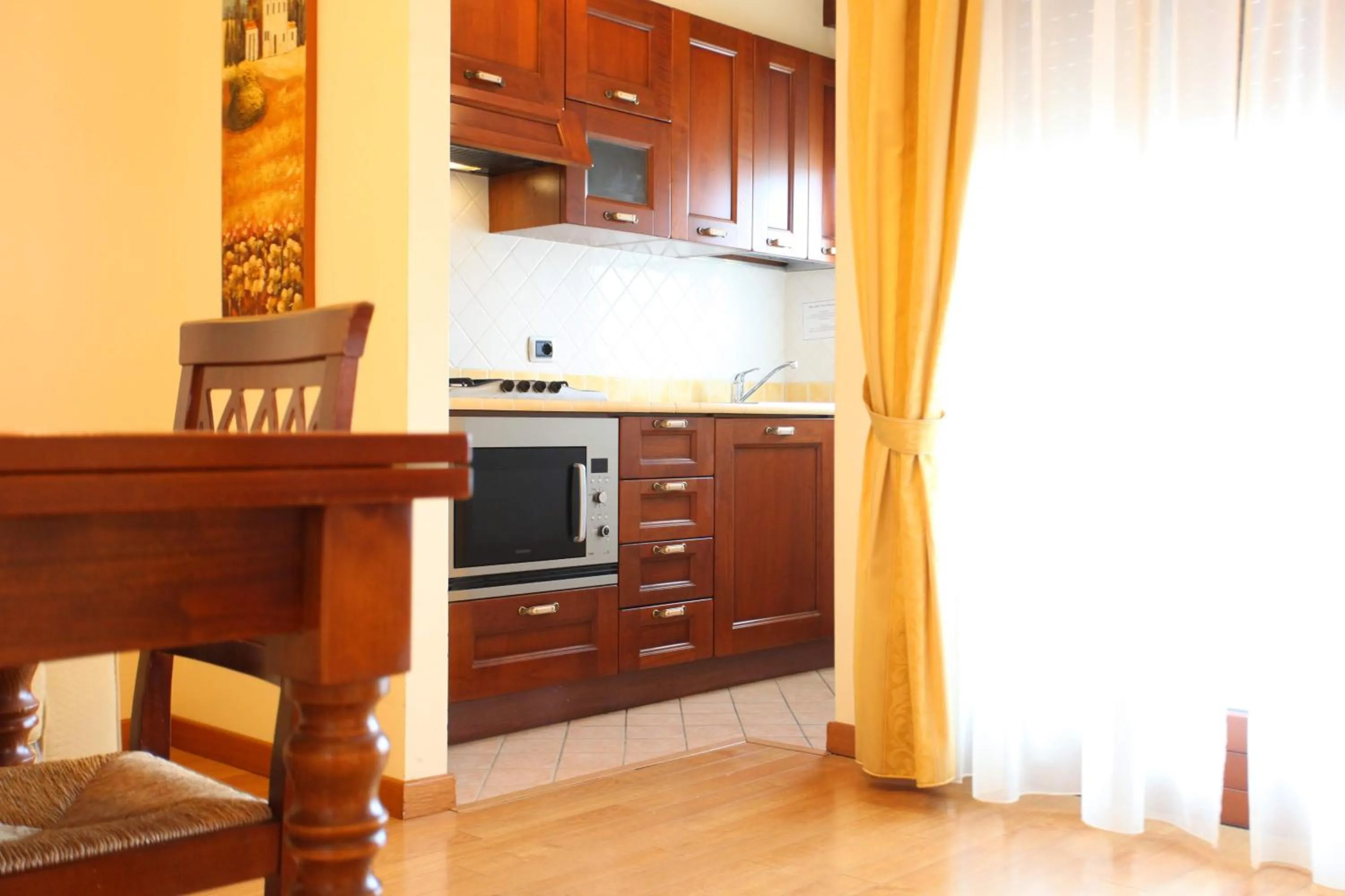 Kitchen or kitchenette in Altea Suites